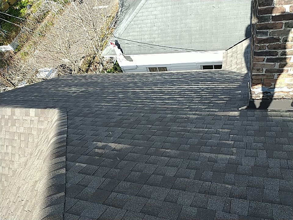 Residential Roofing Installation using Roof Replacement by American Roofing & Construction LLC