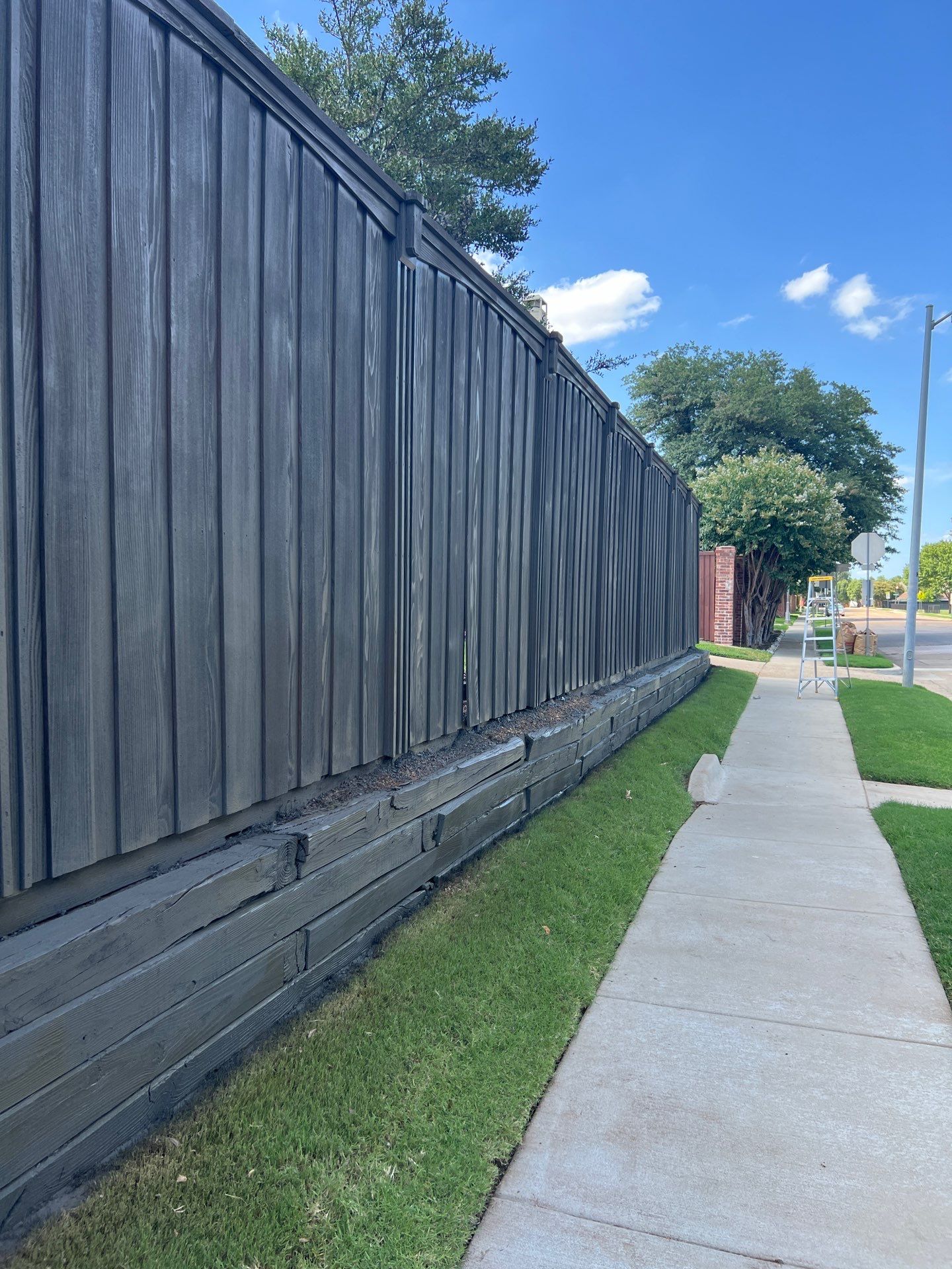 Fence Staining by Nomad Painting