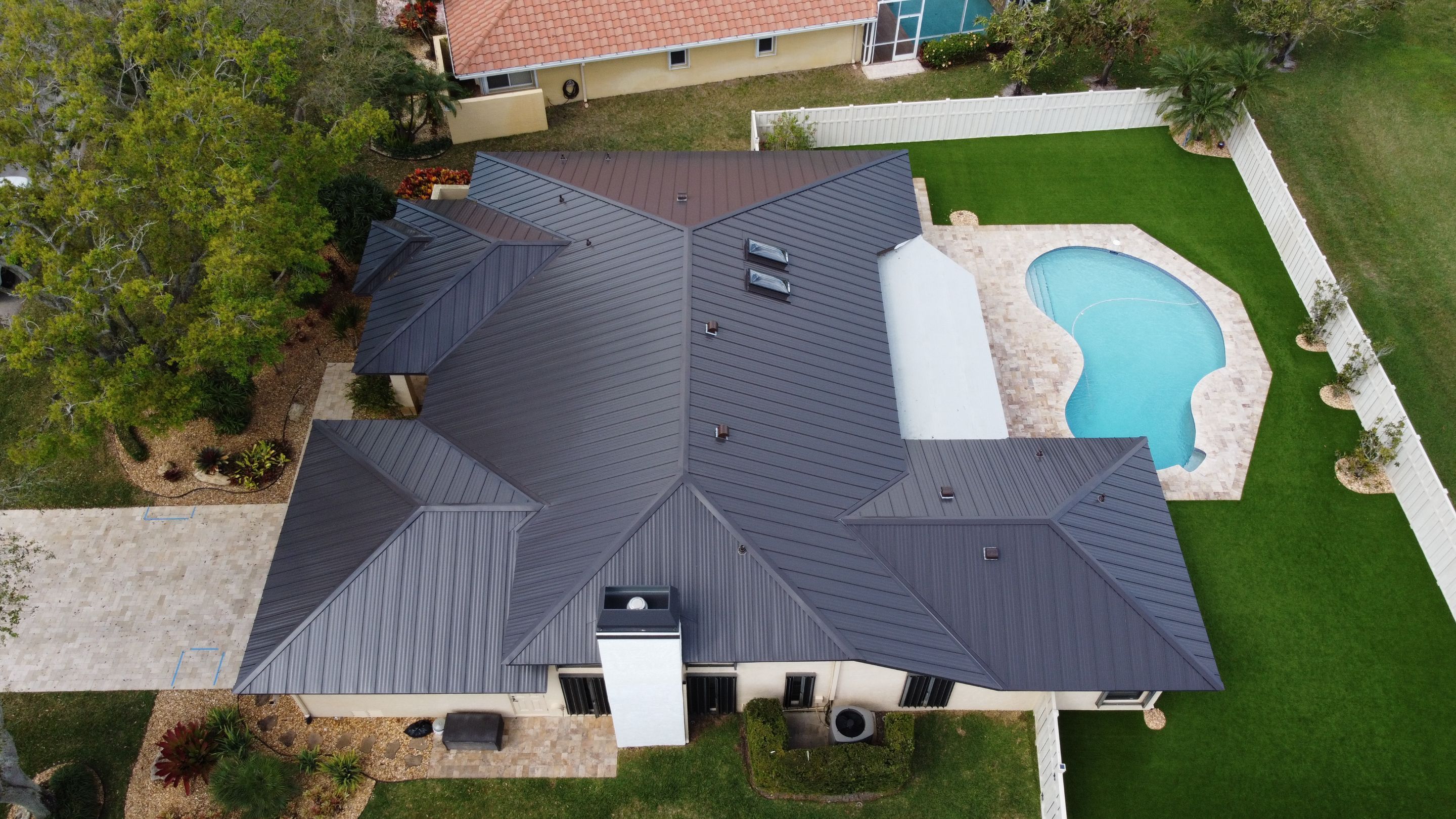 Residential Roofing Installation using 1" Nail strip metal roof by BLUES BROTHERS ROOFING