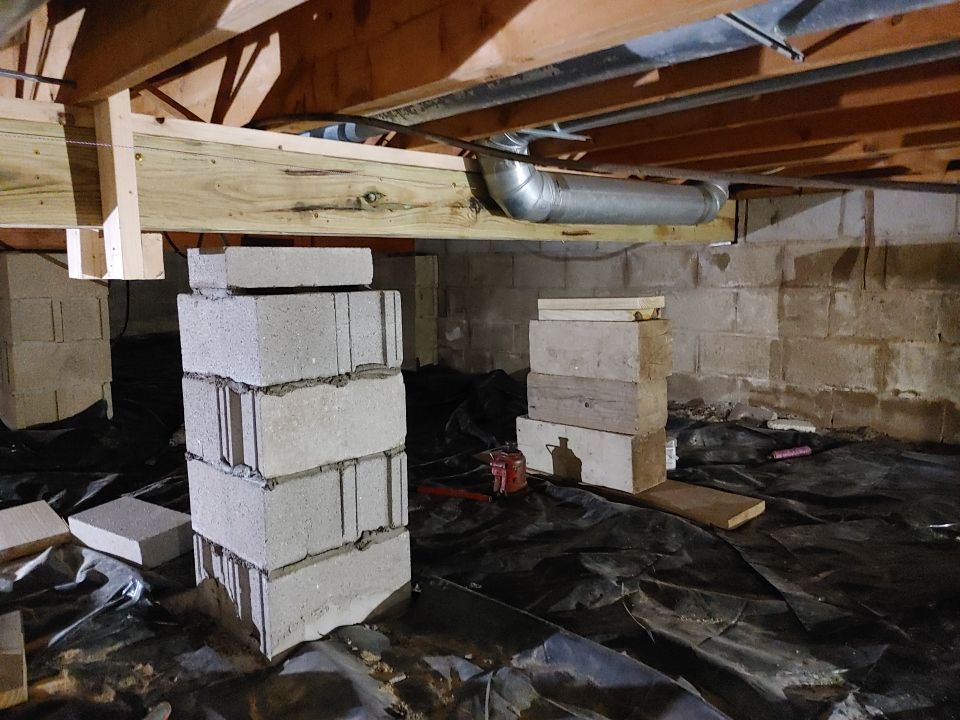 Crawl space encapsulation and Waterproofing using Structural Wood and Steel Reinforcements by Toledo Basement Repair 