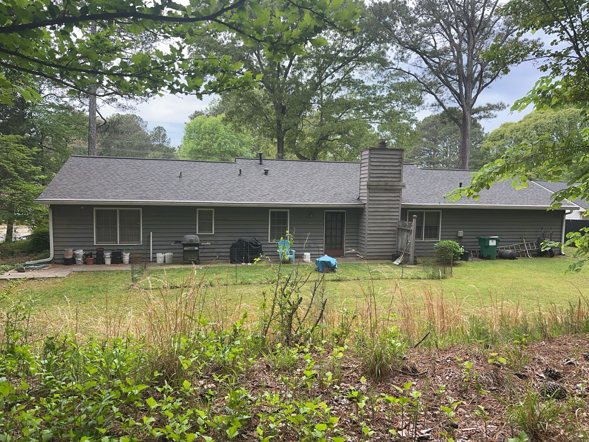Marietta, GA Exterior Painting Transformation with Blue Paint by Nelson Exteriors