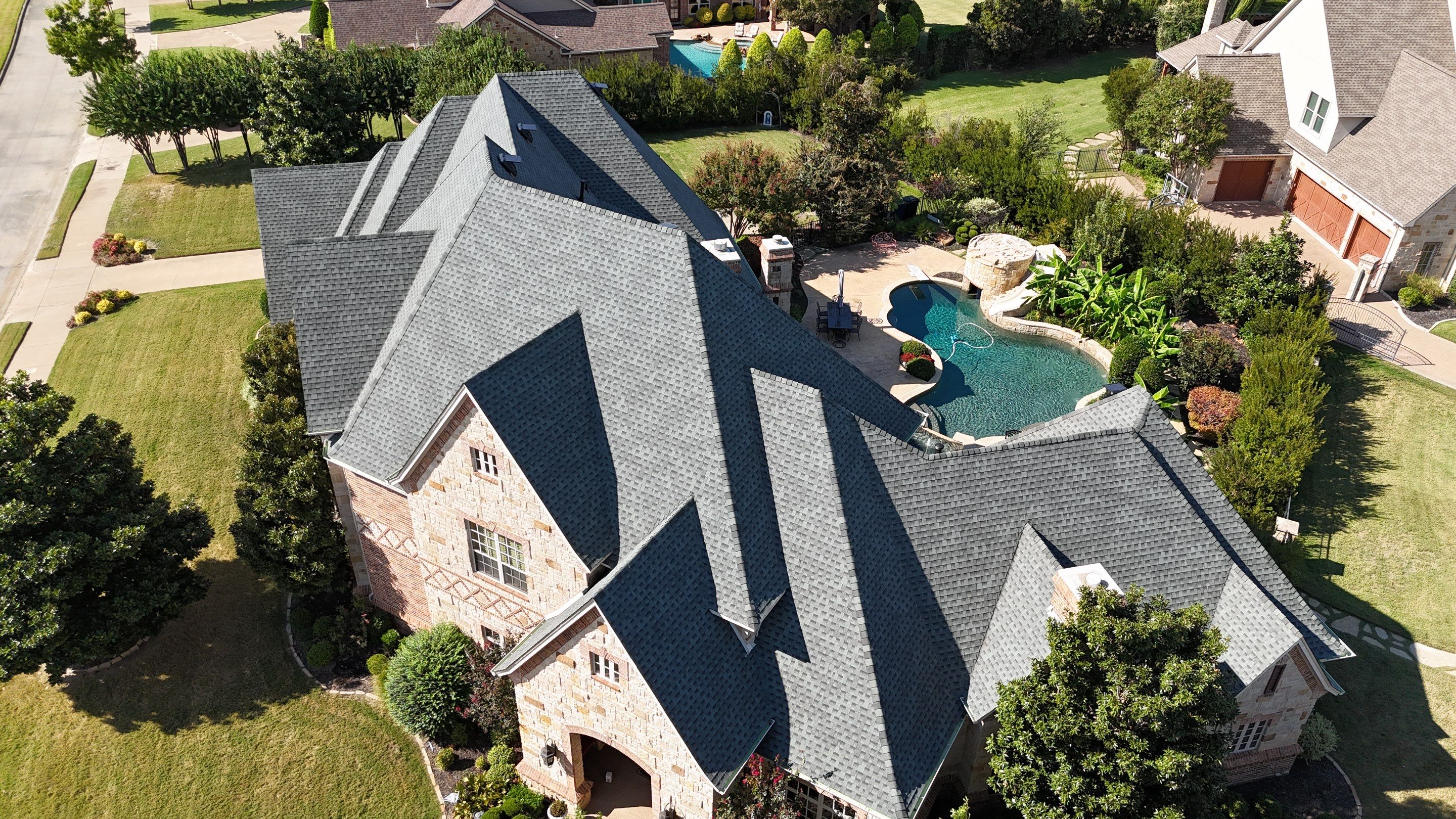 Southlake Texas Estate - Roof, Copper Awning and Gutter Project by First United Roofing & Construction
