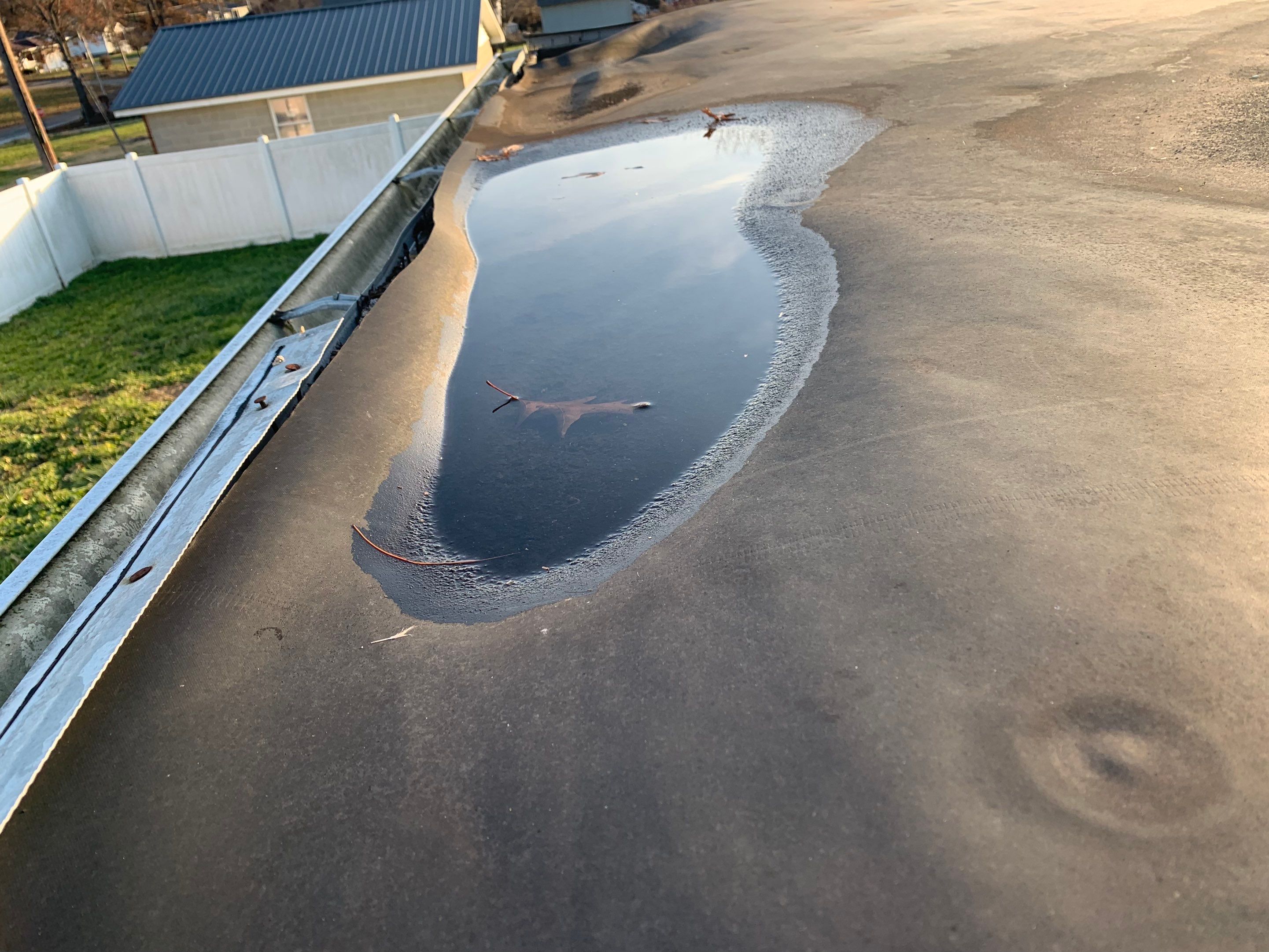 Rubber Roofing  on a residential sunroom by Secure Construction Company Inc