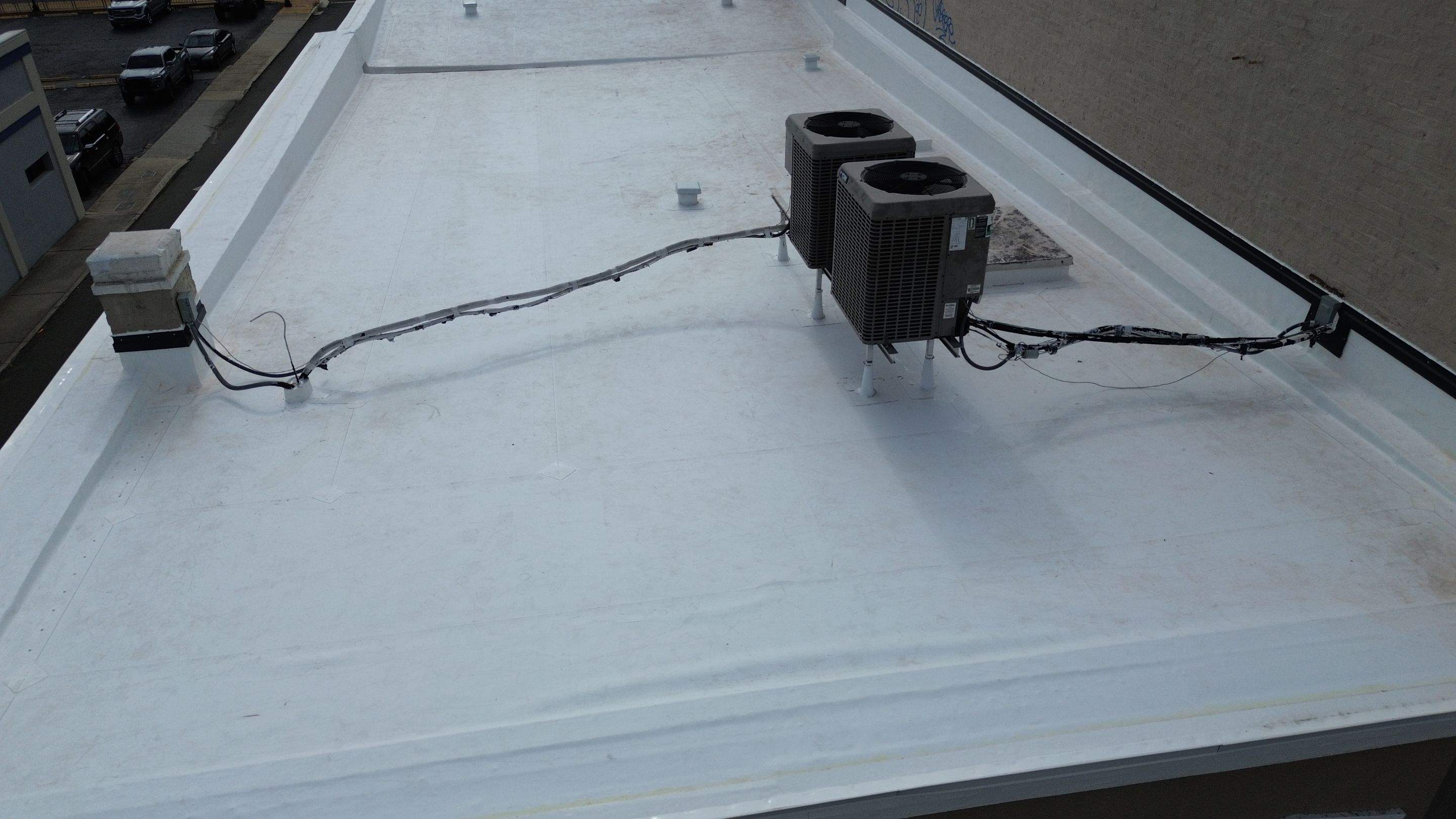 Flat Commercial TPO Reroof in Downtown Ocala, FL by Brehm Roofing