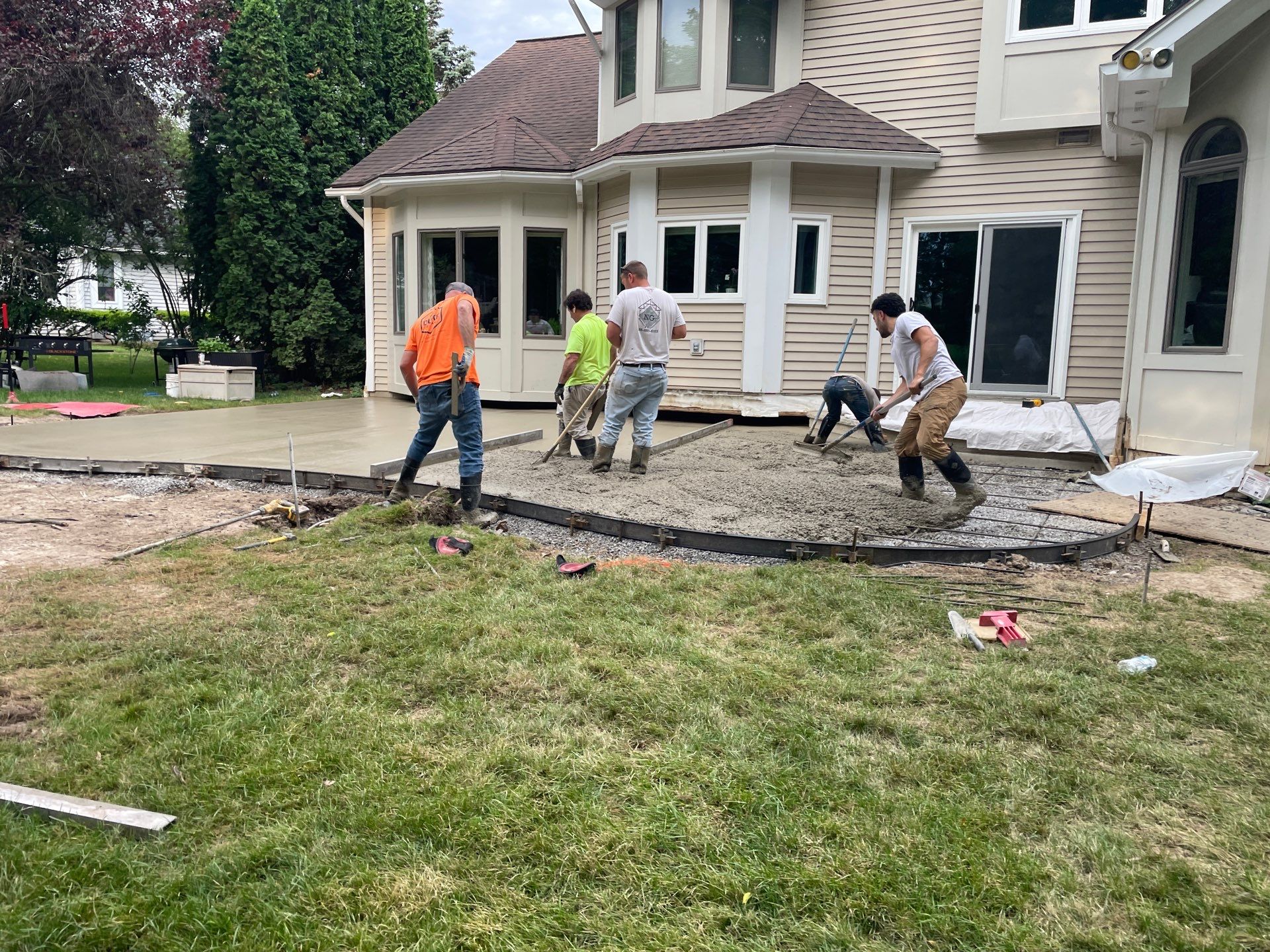 Heavy stone stamped concrete patio and sidewalk  by NG Masonry & Construction LLC