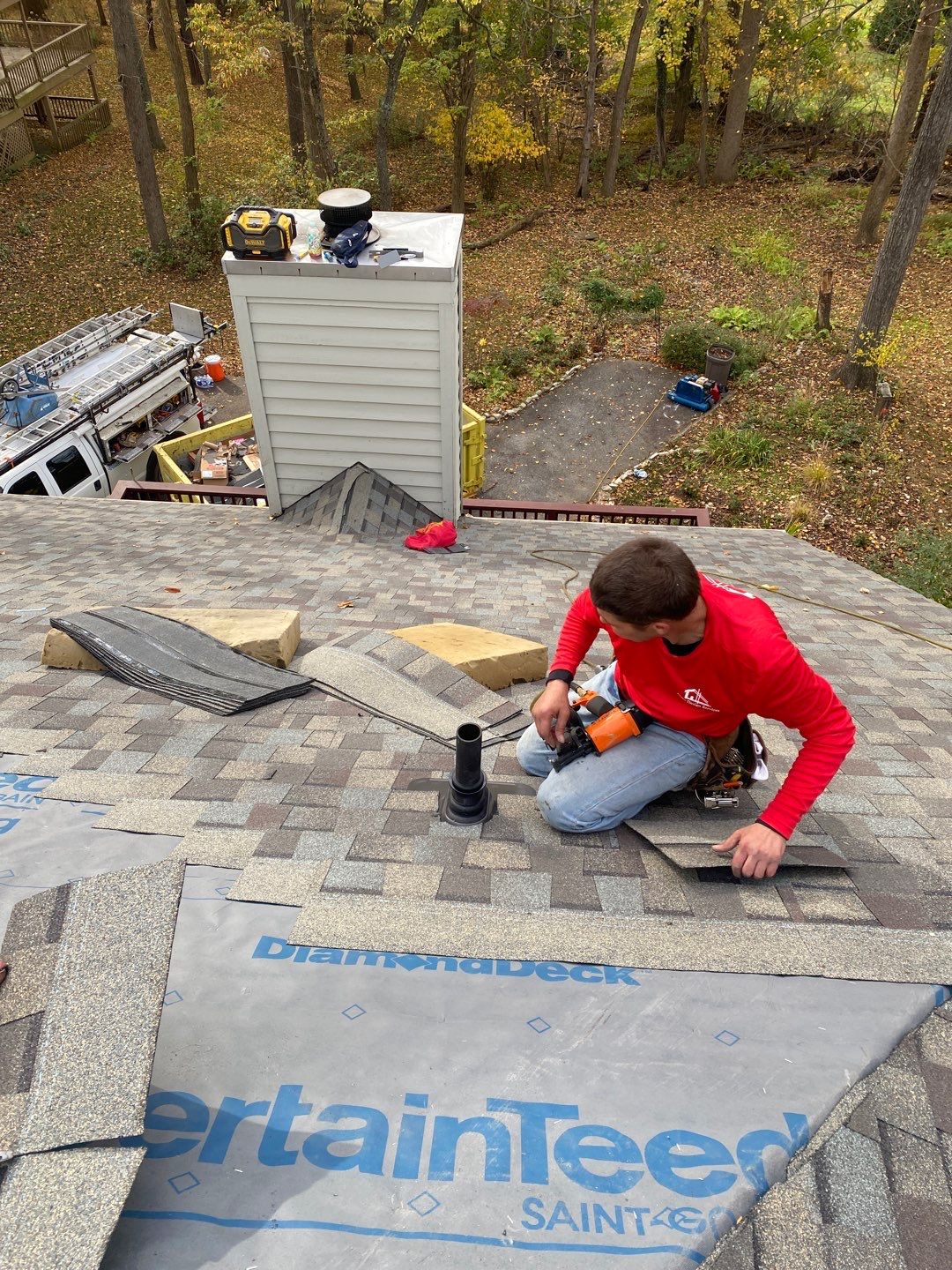 Install new shingles and new skylights  by Alpha Design Services