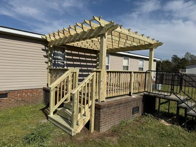 Custom Wooden Pergola and Deck Installation in La Grange, NC