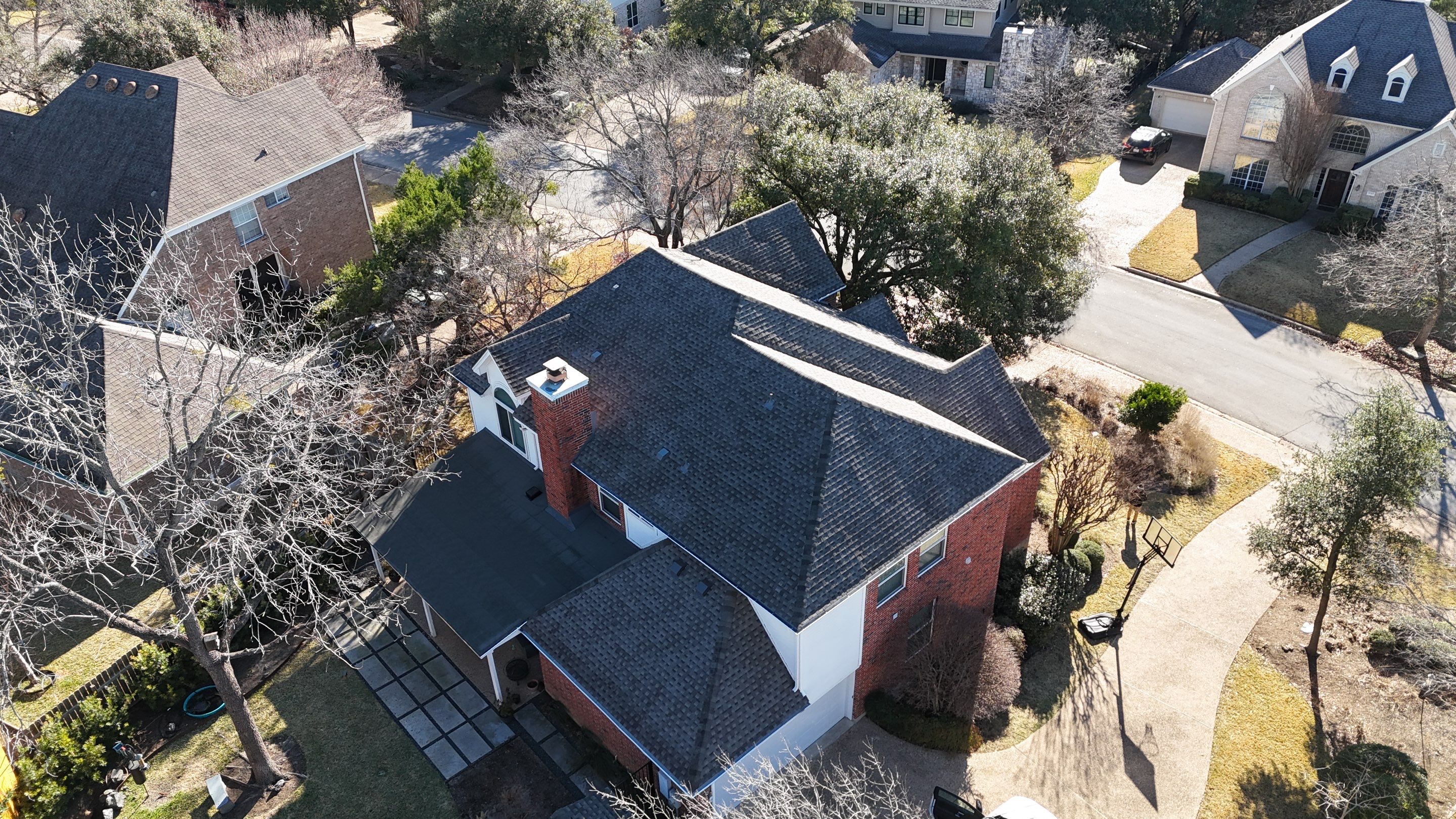 Residential Roof Replacement using GAF - Armorshield ll - Weathered Wood by Action Exteriors Austin