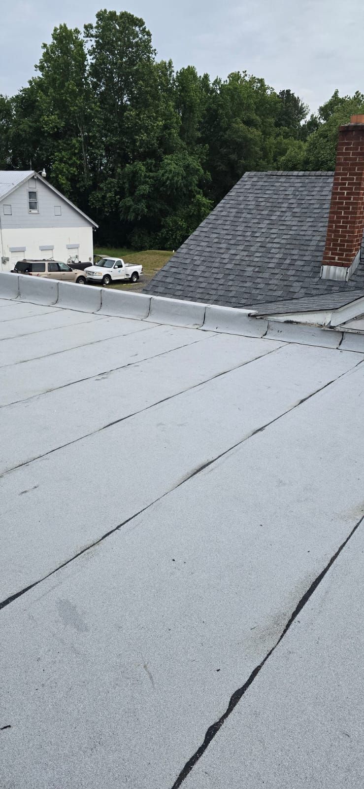 Roof Installation using Silicone APP Elevate Coating by ExteriorPros