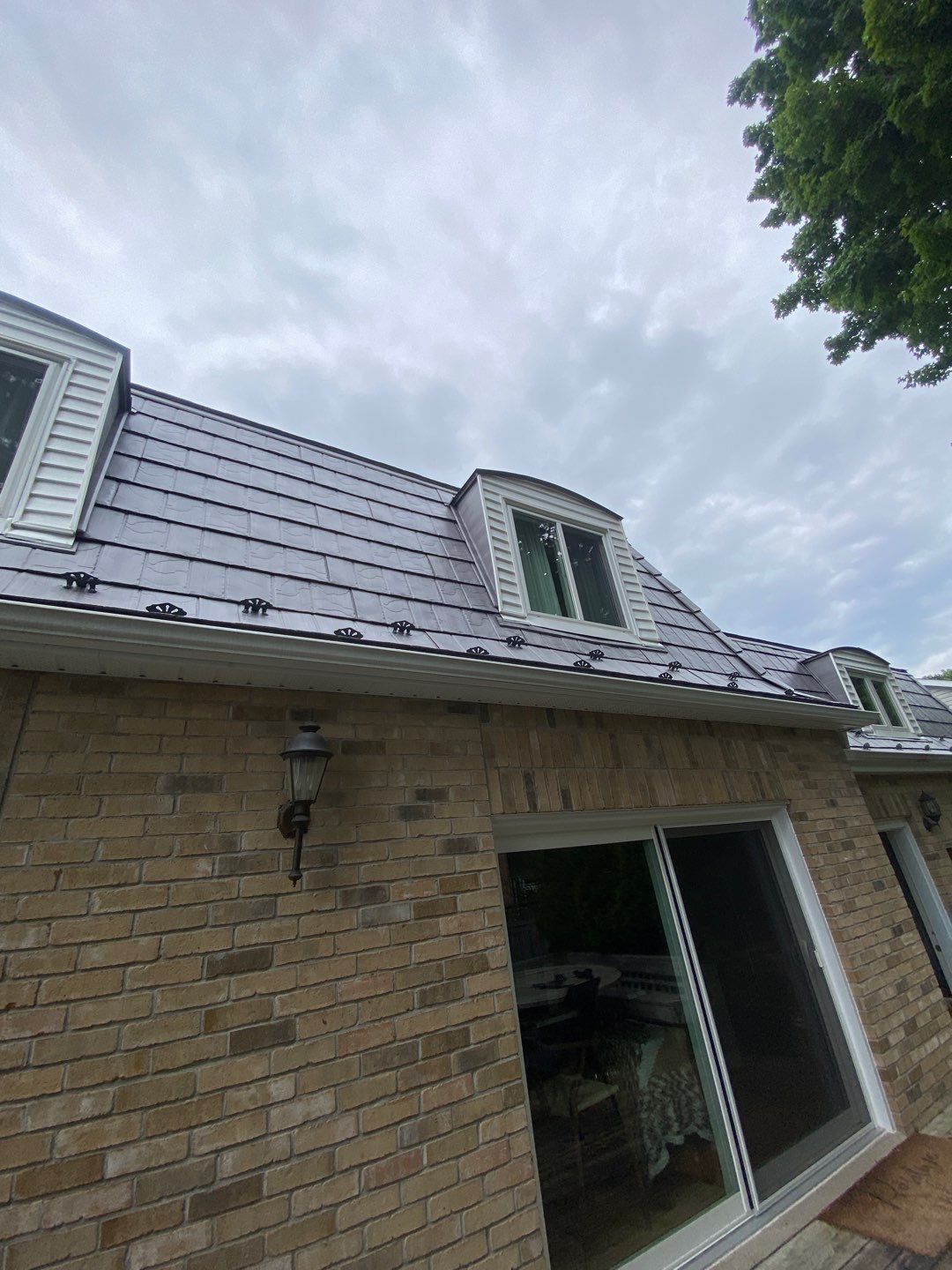 Metal work using Vicwest True Natuer. Metal Shingle by Jay Carter Roofing & Sheet Metal