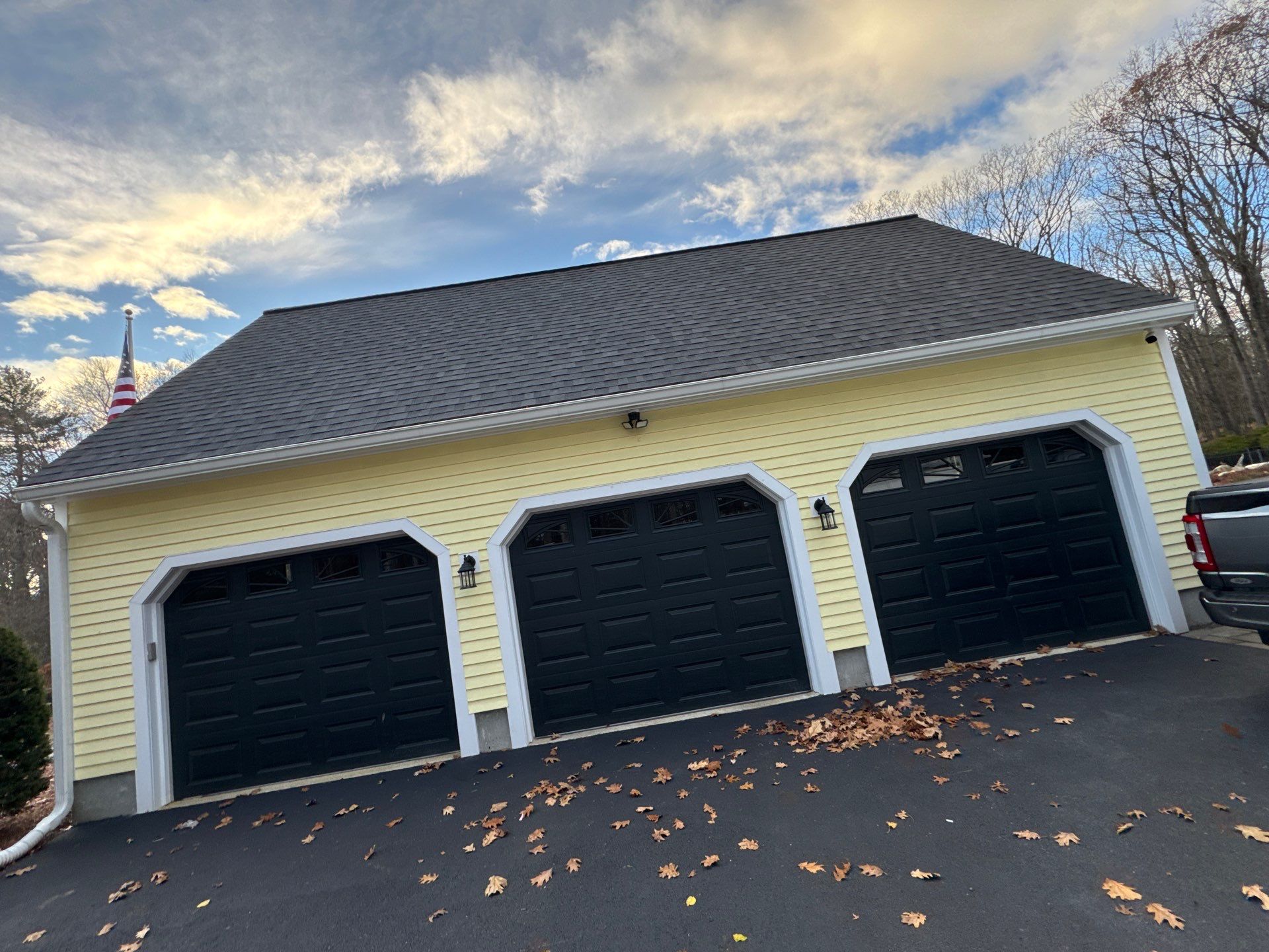 Chelmsford Premium Roof: Onyx Black Shingles with Standing Seam Metal Porch by Mighty Dog Roofing of Greater Middlesex County