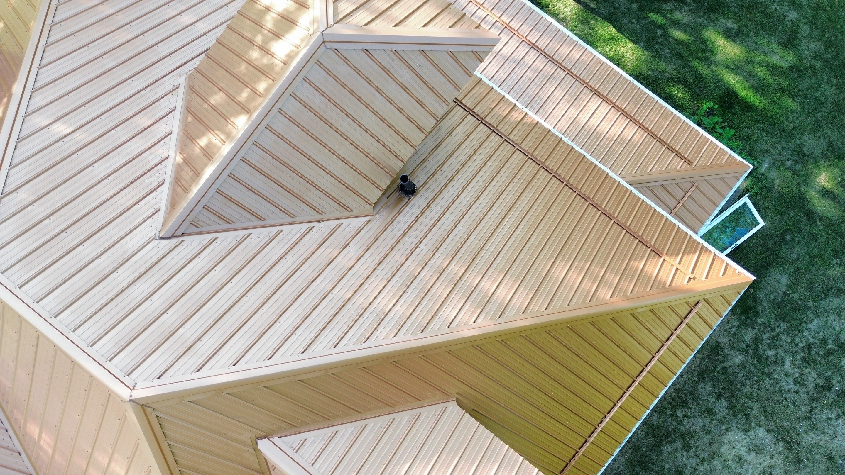 Residential Roofing Installation using Performance Panel Metal - Copper Metallic by RoofX 