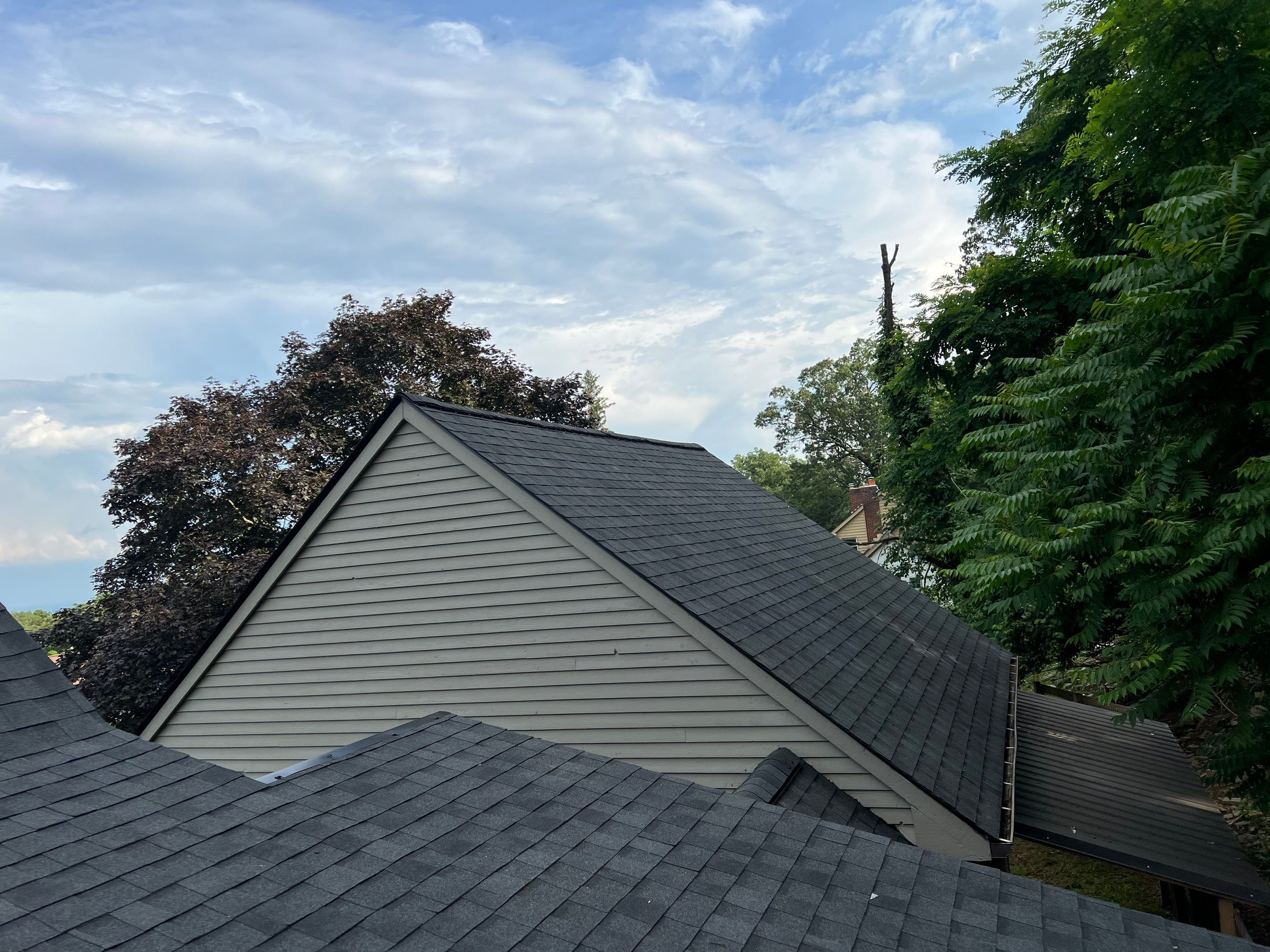 Residential Roofing Installation using Atlas Pinnacle Pristine Black Architectural Shingles by Frederick Roof Repair