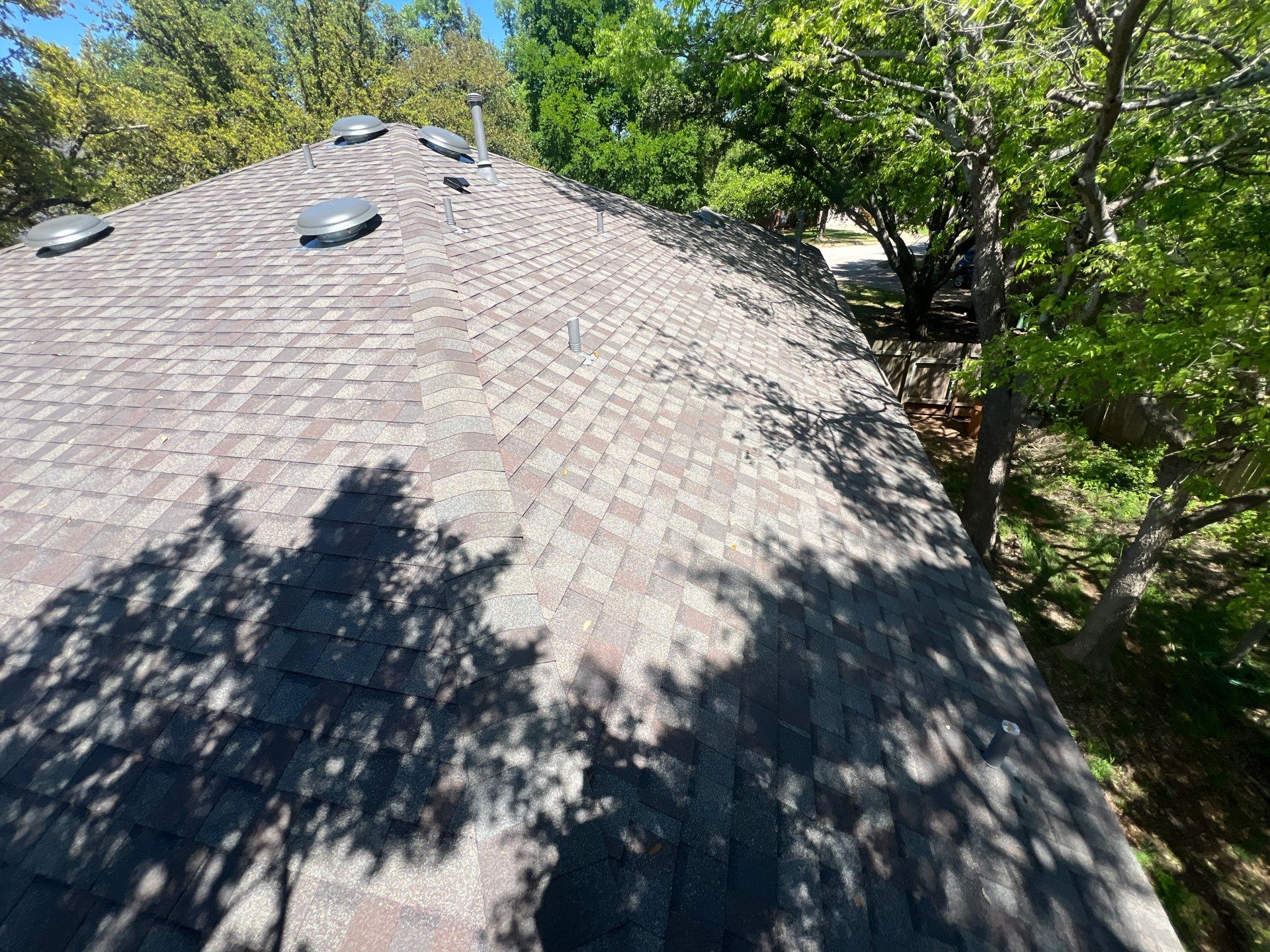 Rental property upgrade using CertainTeed Landmark shingles. by Oakwood Roofing and Construction, LLC