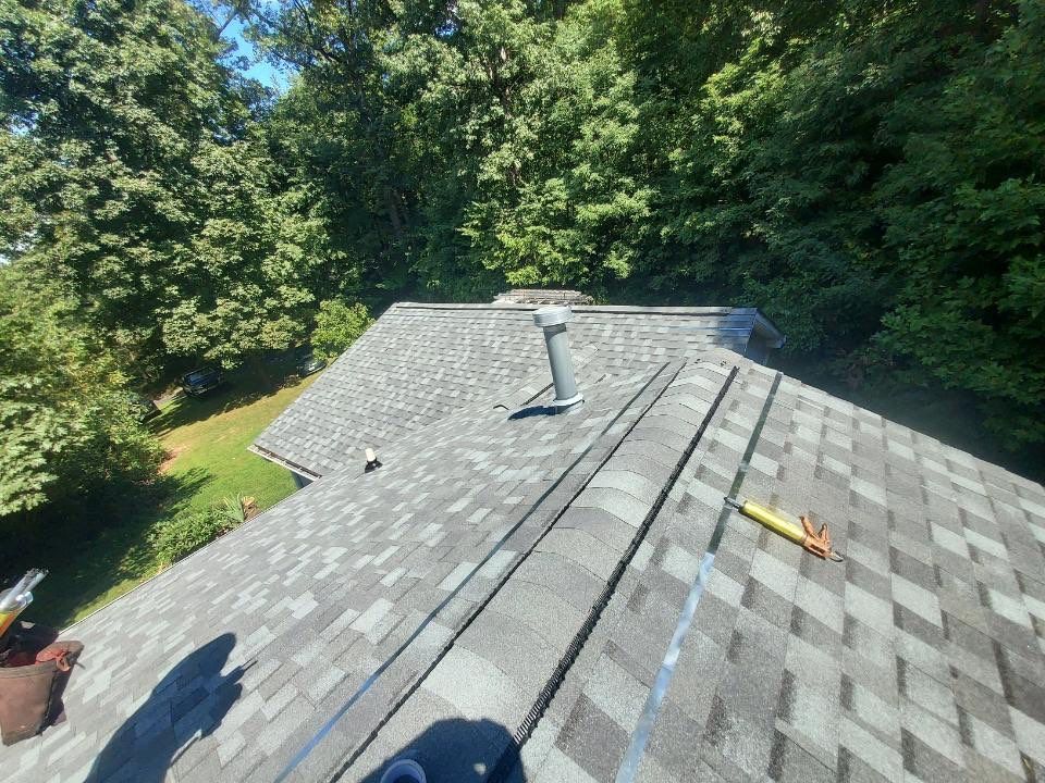 Residential Roofing Installation using Atlas Pinnacle Pristine Coastal Granite Architectural Shingles by Frederick Roof Repair