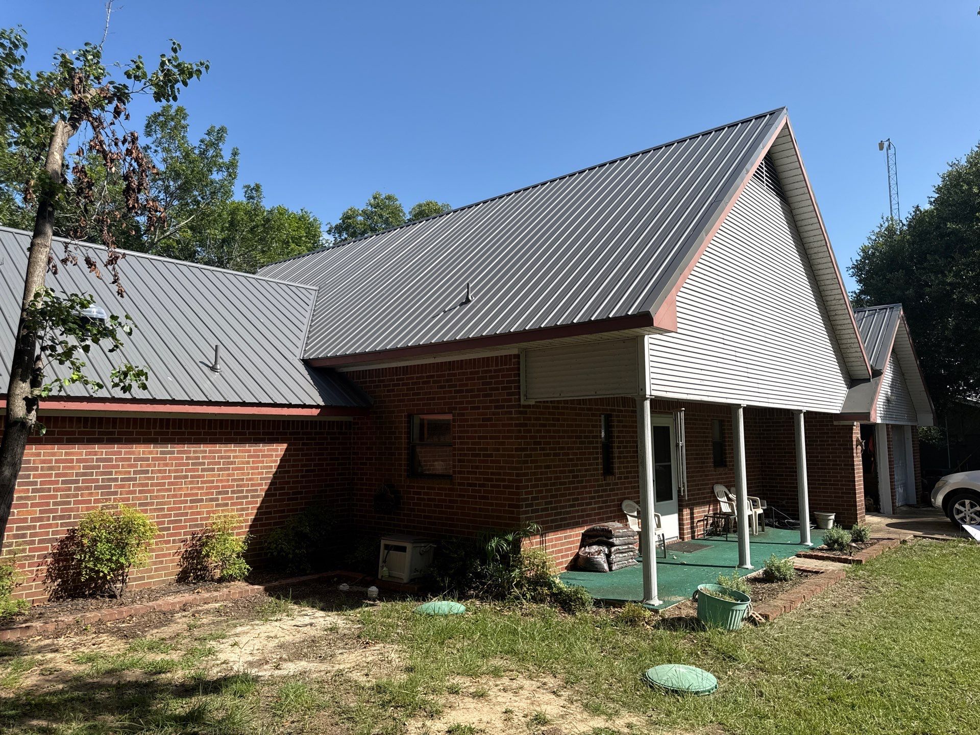 Charcoal Metal Roof at Lake Limestone, Tx by DT Roofing - Seth Wells