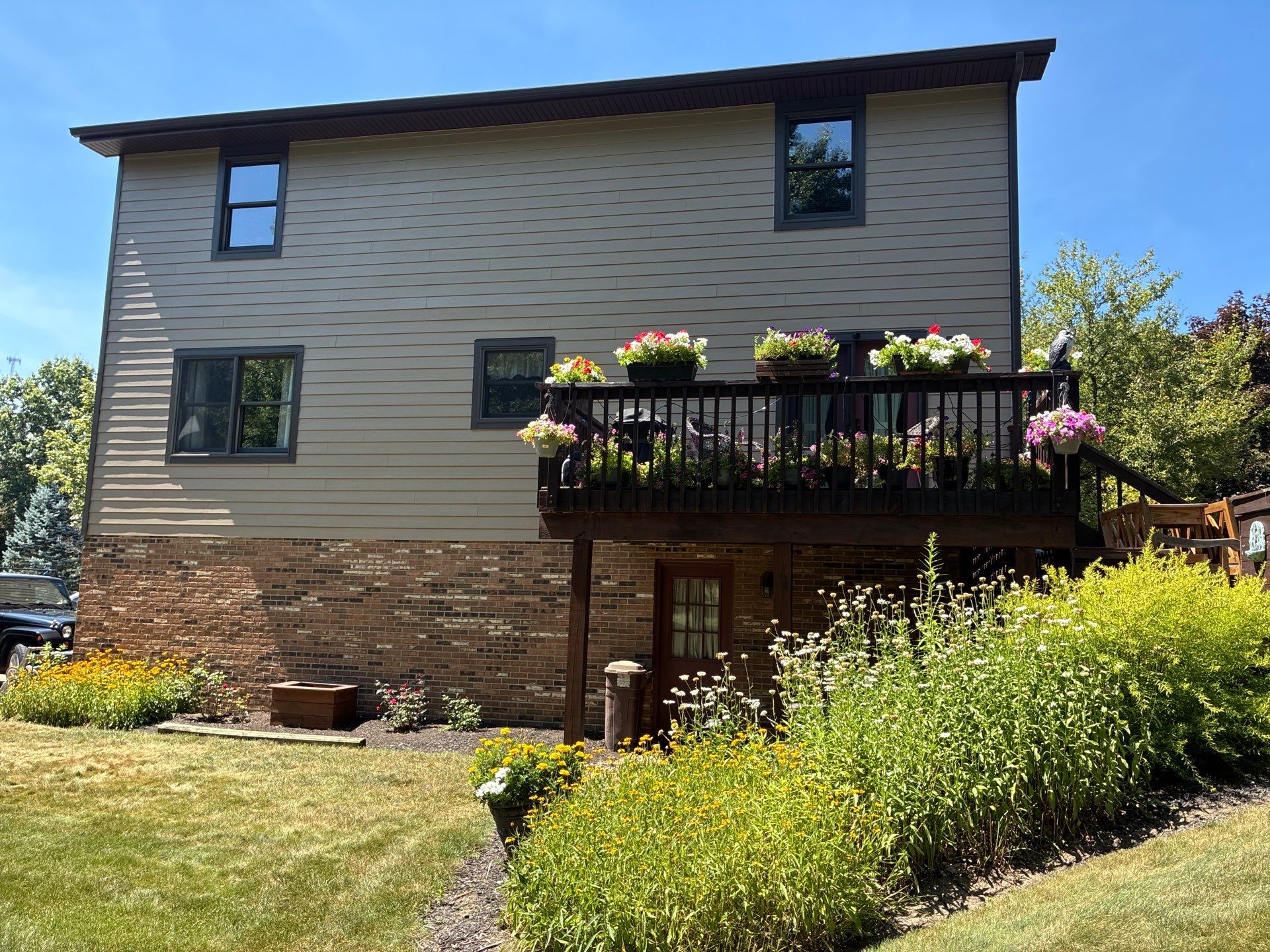 Full House James Hardie Lap Siding and Trim Renovation With Modern Dark Trim In Wexford / Mars PA by Ideal Siding Pittsburgh