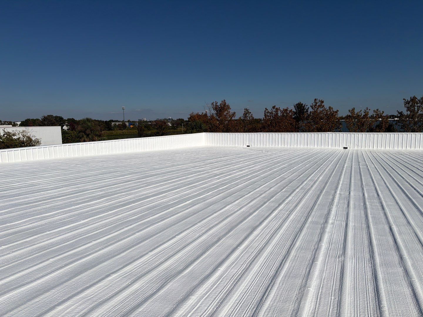 Orlando Commercial Metal Roof Restoration and Silicone Coating System by CES Roofing