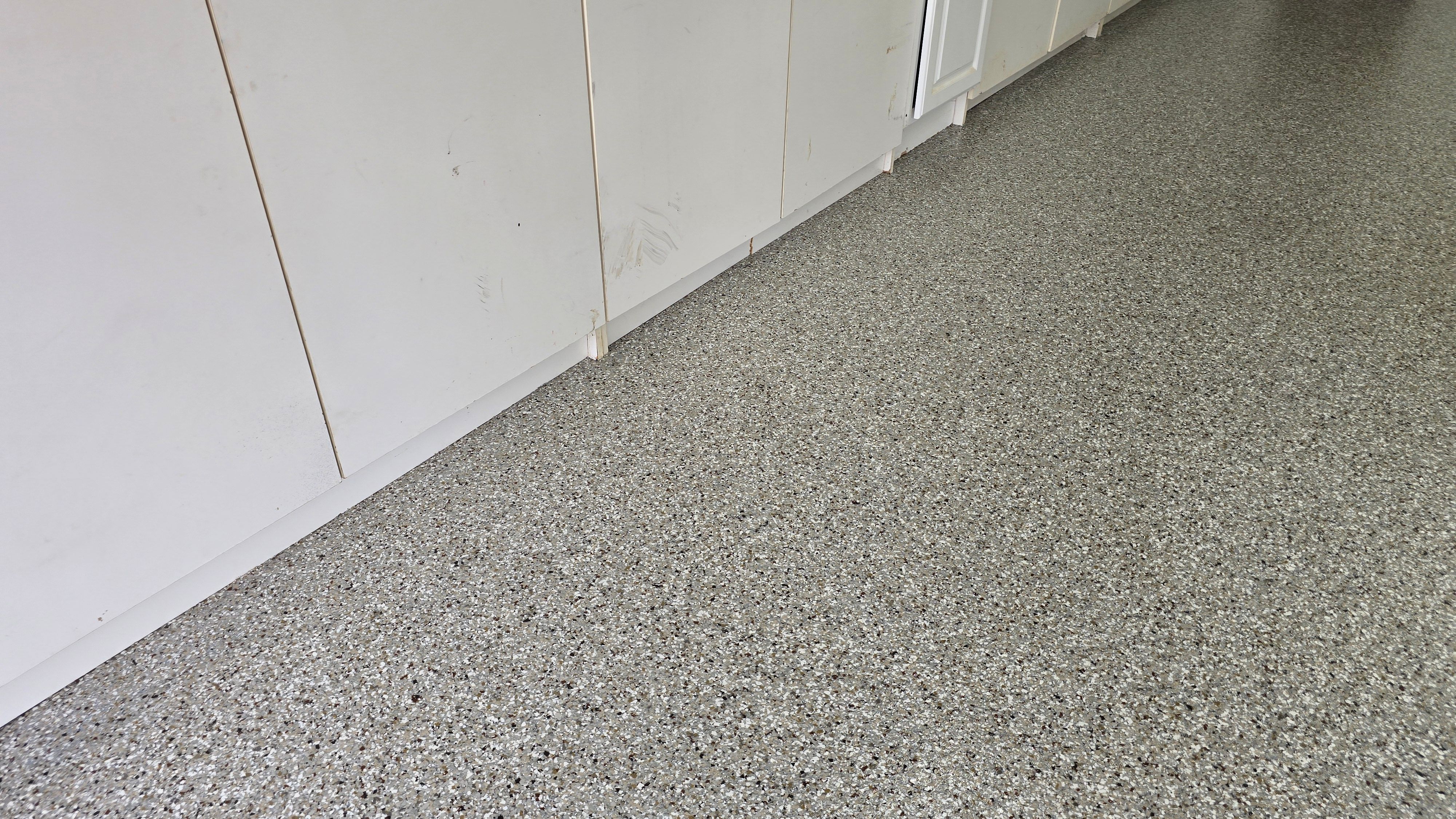Driveway, Garage, Porch, and Sidewalk using Creekbed by Elite Floor Solutions