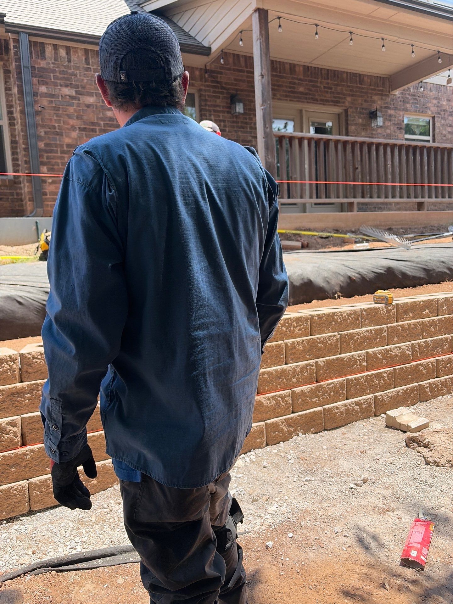 Custom Segmental Block Retaining Wall and Sod Installation in Lawton by Clays Services Inc