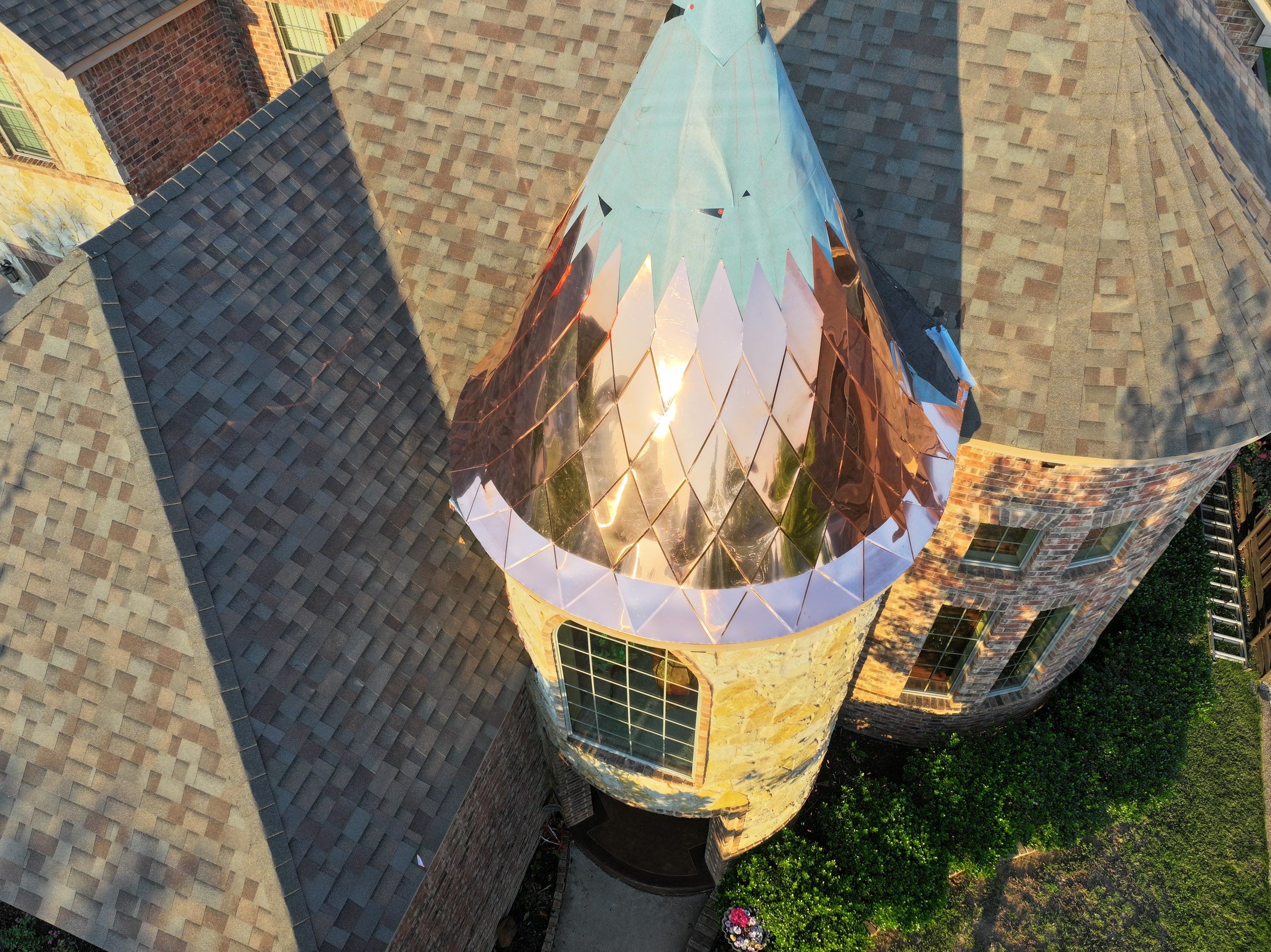 Installing Custom copper turret and Malarkey Vista Class 4 shingles Hail Damage Upgrade by Becker Roofing and Exteriors