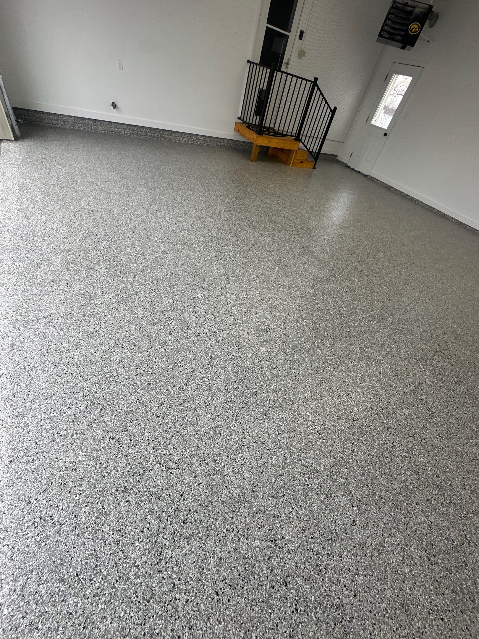 Marshalltown Garage Floor Renovation by Revival Concrete Coatings