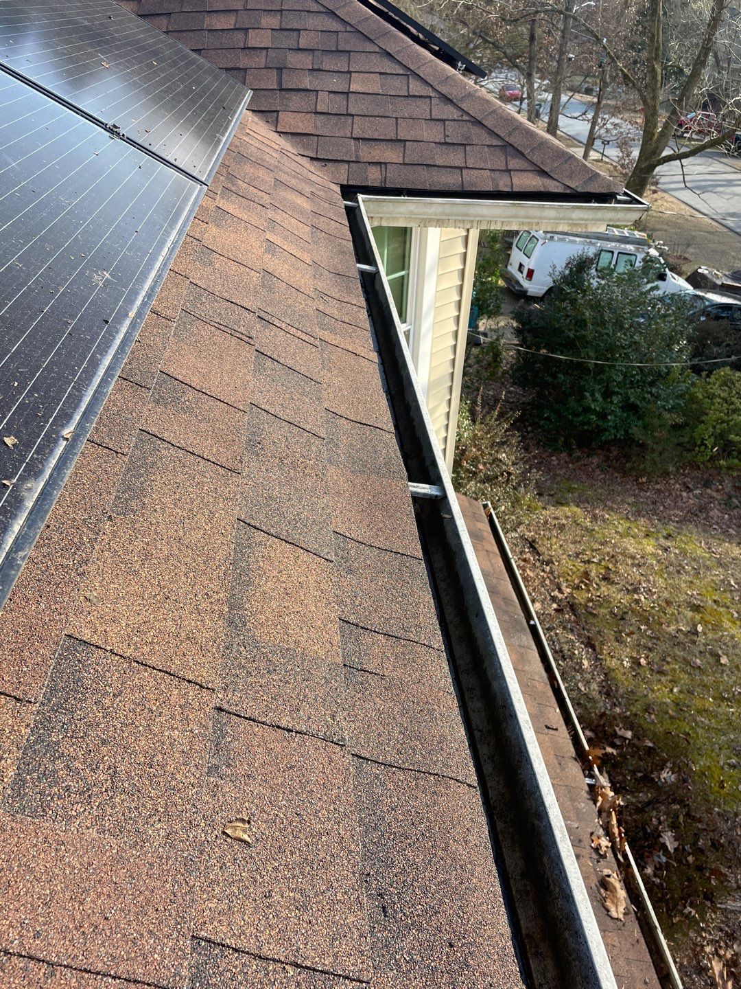 Cleaning Gutters  by Deerfield Roofing LLC