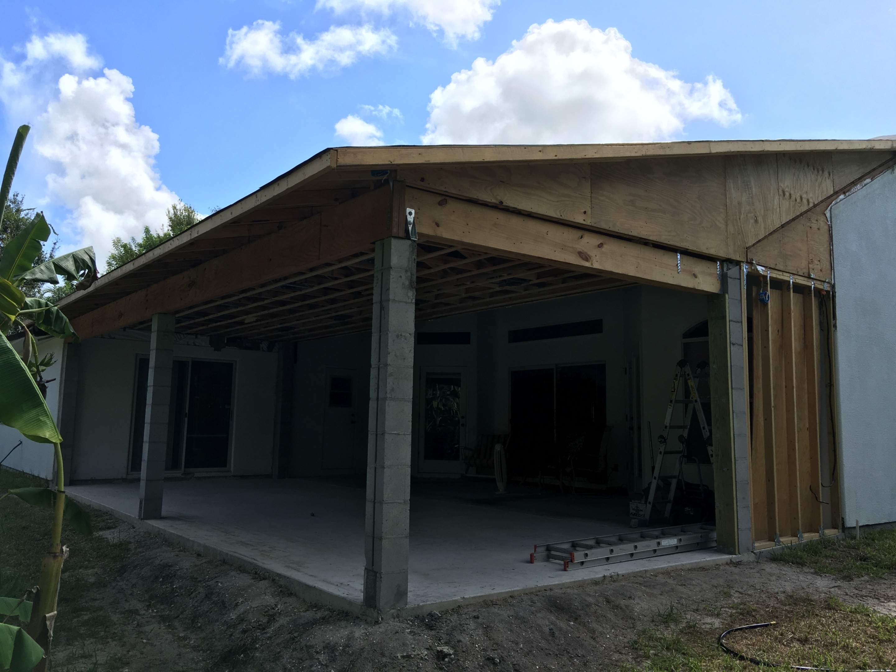 Covered Porch Extension and Structural Patio Addition in Melbourne by Florida Roofing and Renovations Inc.