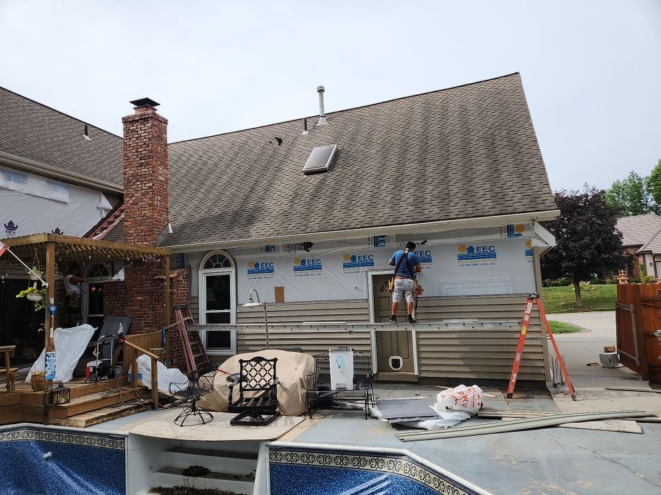 All New Craneboard D7 siding and New prefinished front door   by EEC  Windows, Siding & Roofing 