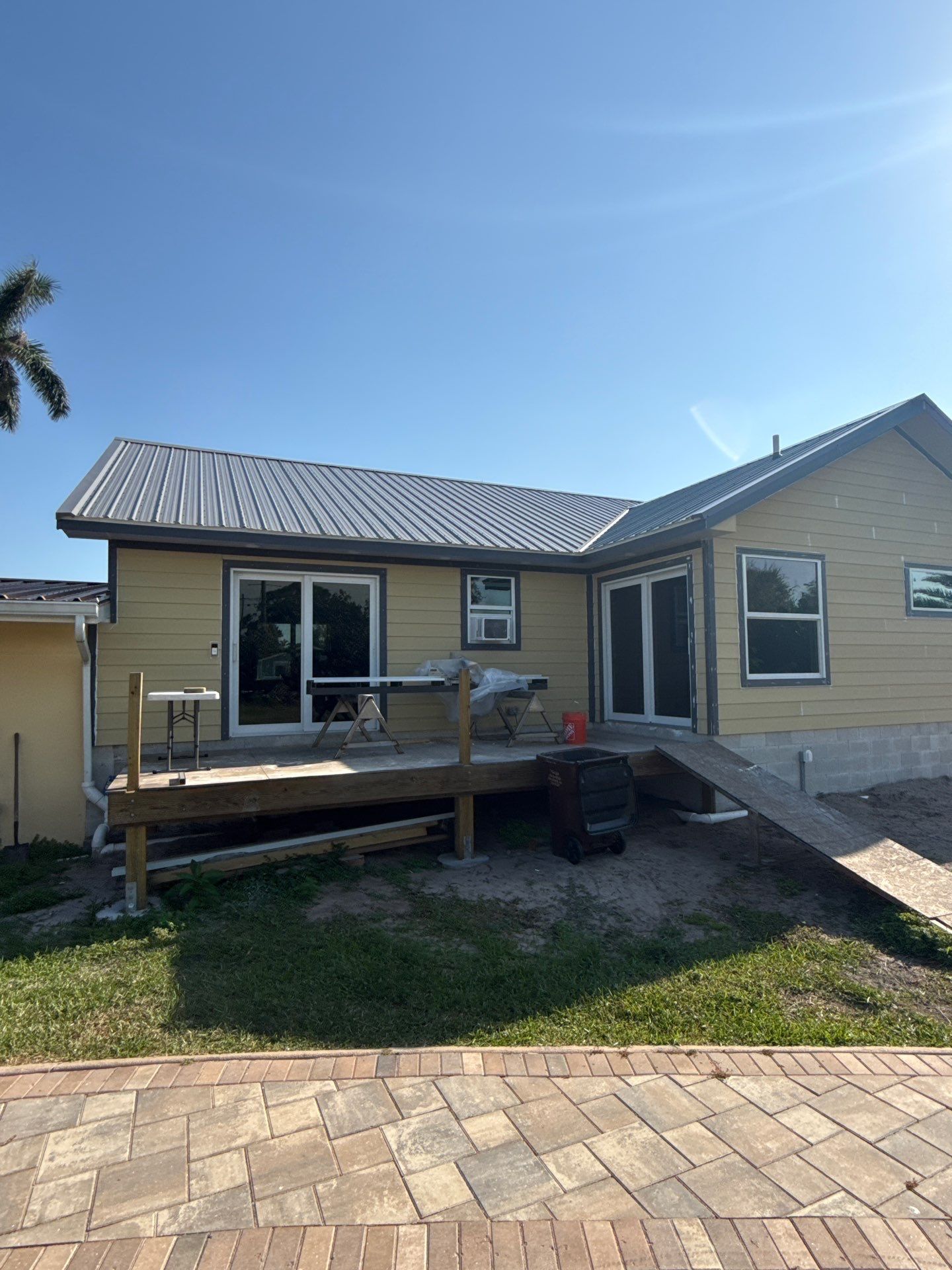 Musket Brown Seamless Gutters Installation in Saint James City, FL  by Gutter Professors