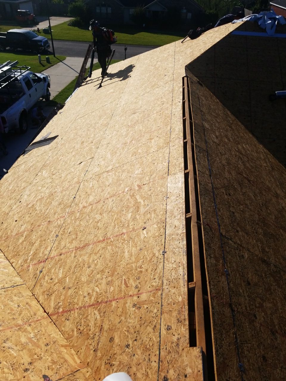 Residential Roofing Installation using Roof Replacement by American Roofing & Construction LLC