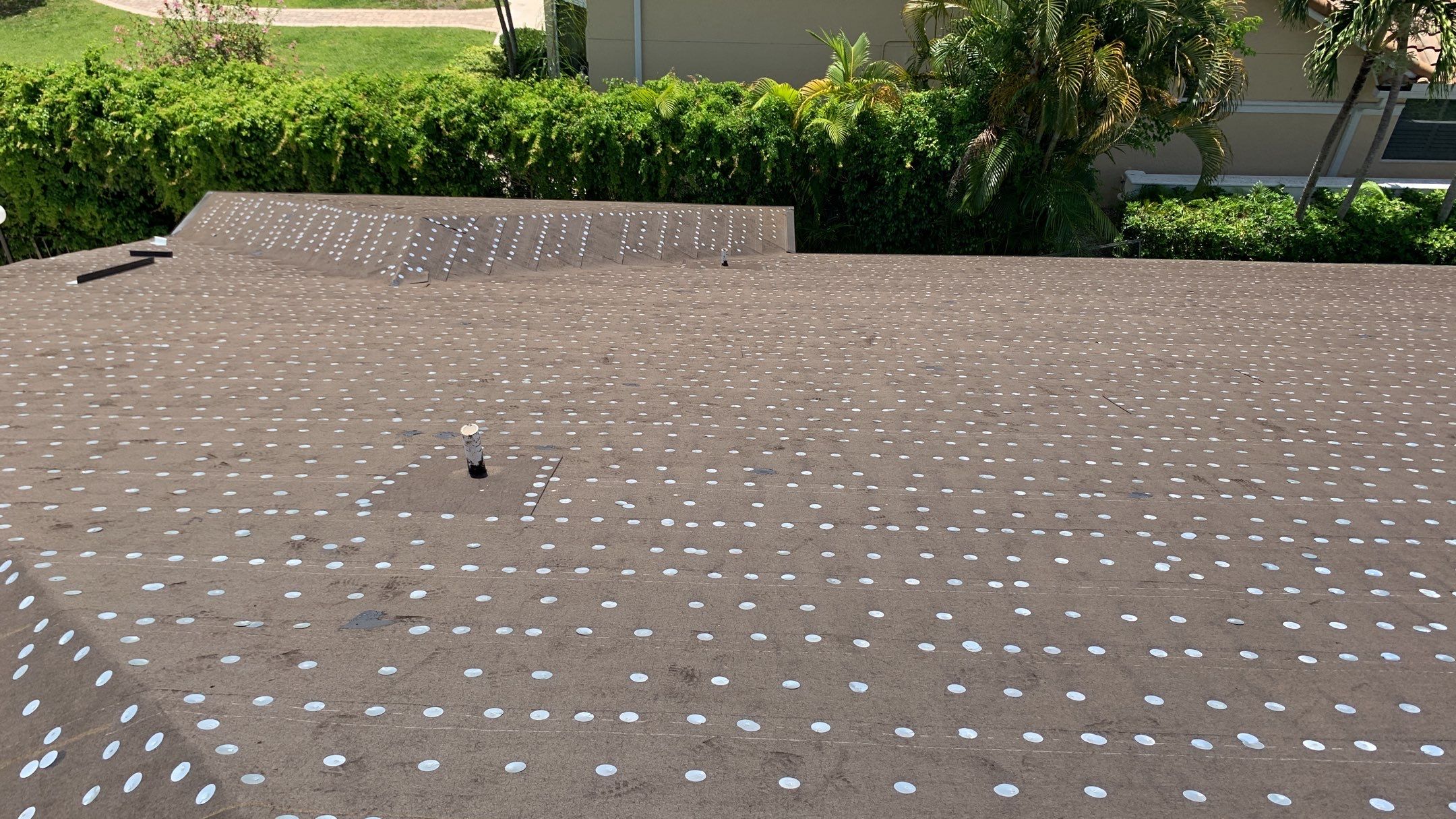 Residential Roofing Installation using 1" Nail strip metal roof by BLUES BROTHERS ROOFING