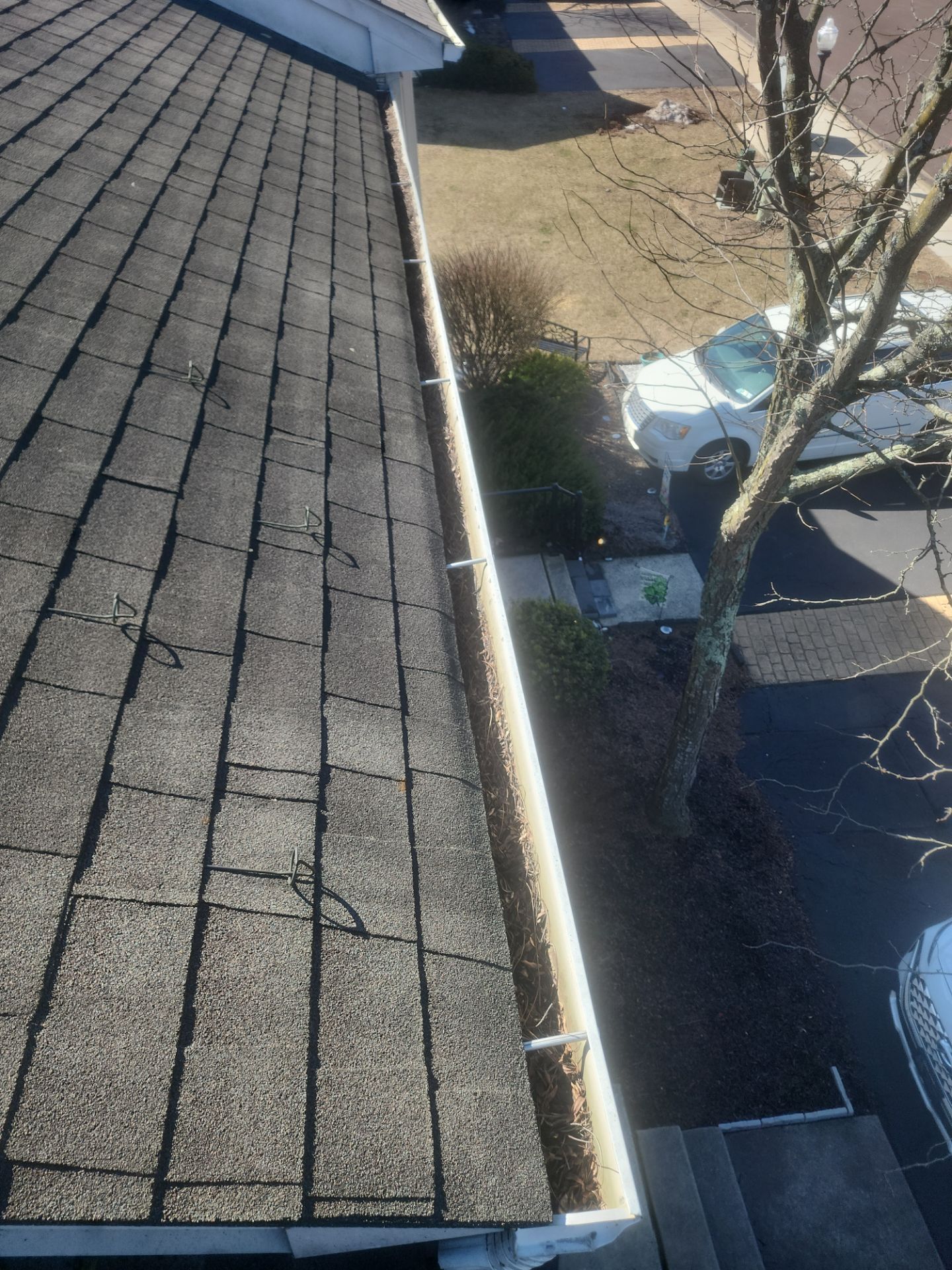 Commercial gutter cleaning Allentown & Bethlehem before photo with filled gutters
