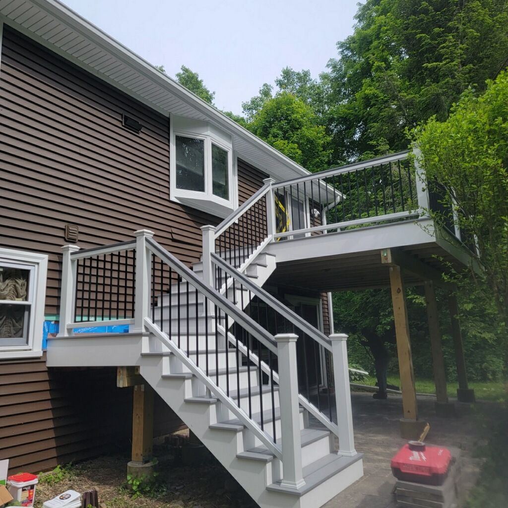 Deck replacement using Trex Lineage Rainier, Cocktail Rail, Rainescape by DiGiorgi Roofing and Siding Inc