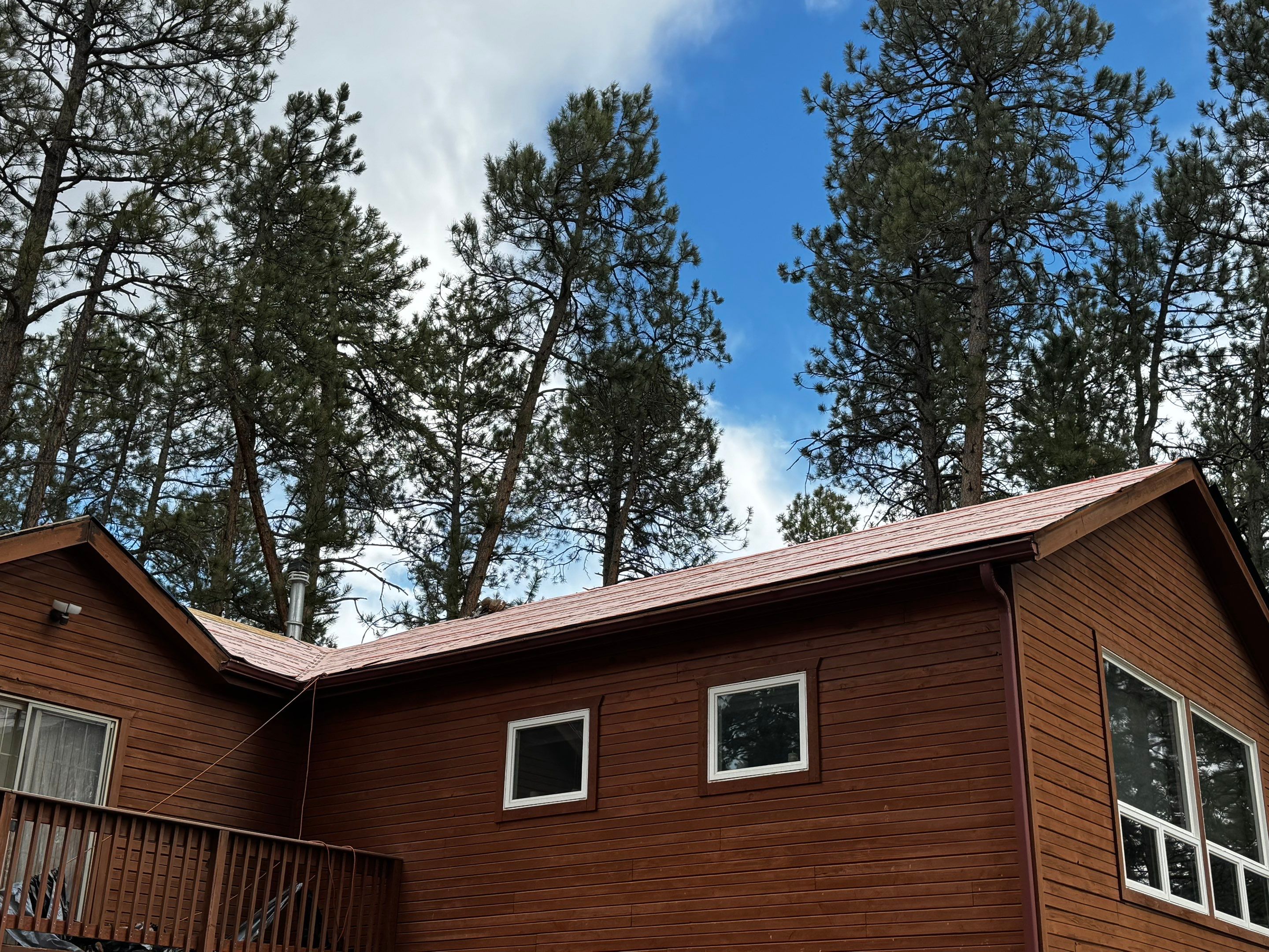 Residential Roofing Installation using Standing Seam Metal by Blue Peaks Roofing LLC 