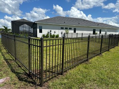 Aluminum Fence Installation using 4Ft Bronze 3 Rail Aluminum Fence