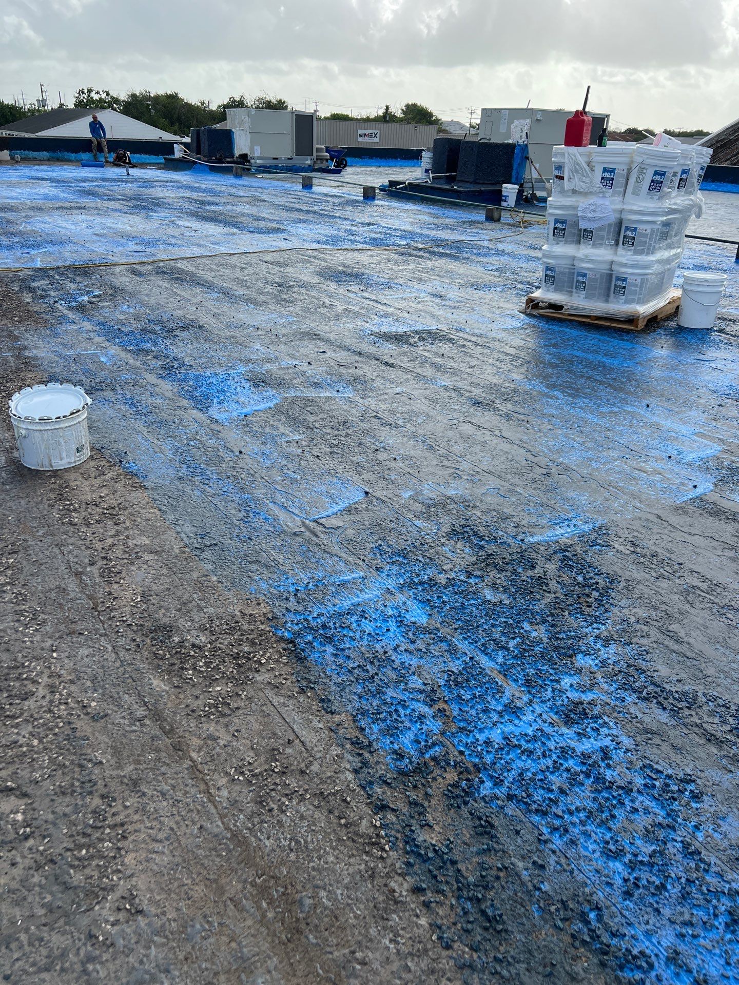 Dirty leaking Gravel Roof by Bayfront Roofing and Construction