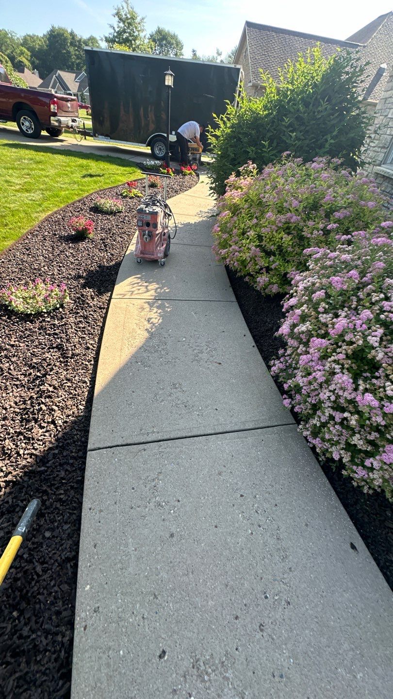 Driveway + Garage + Walkway Project in Meridian by Floors in a Day, Inc