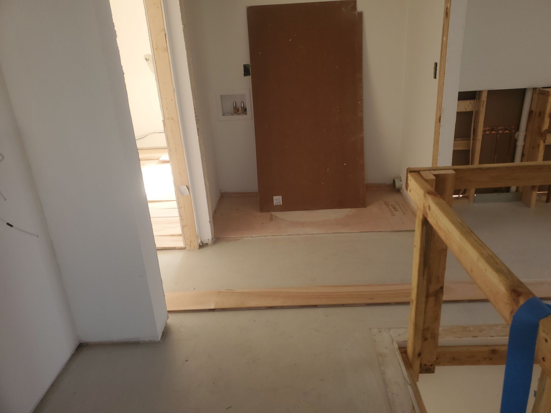 Full glue down Installation over radiant heat 7" Maple character grade by Ann Arbor Hardwoods 