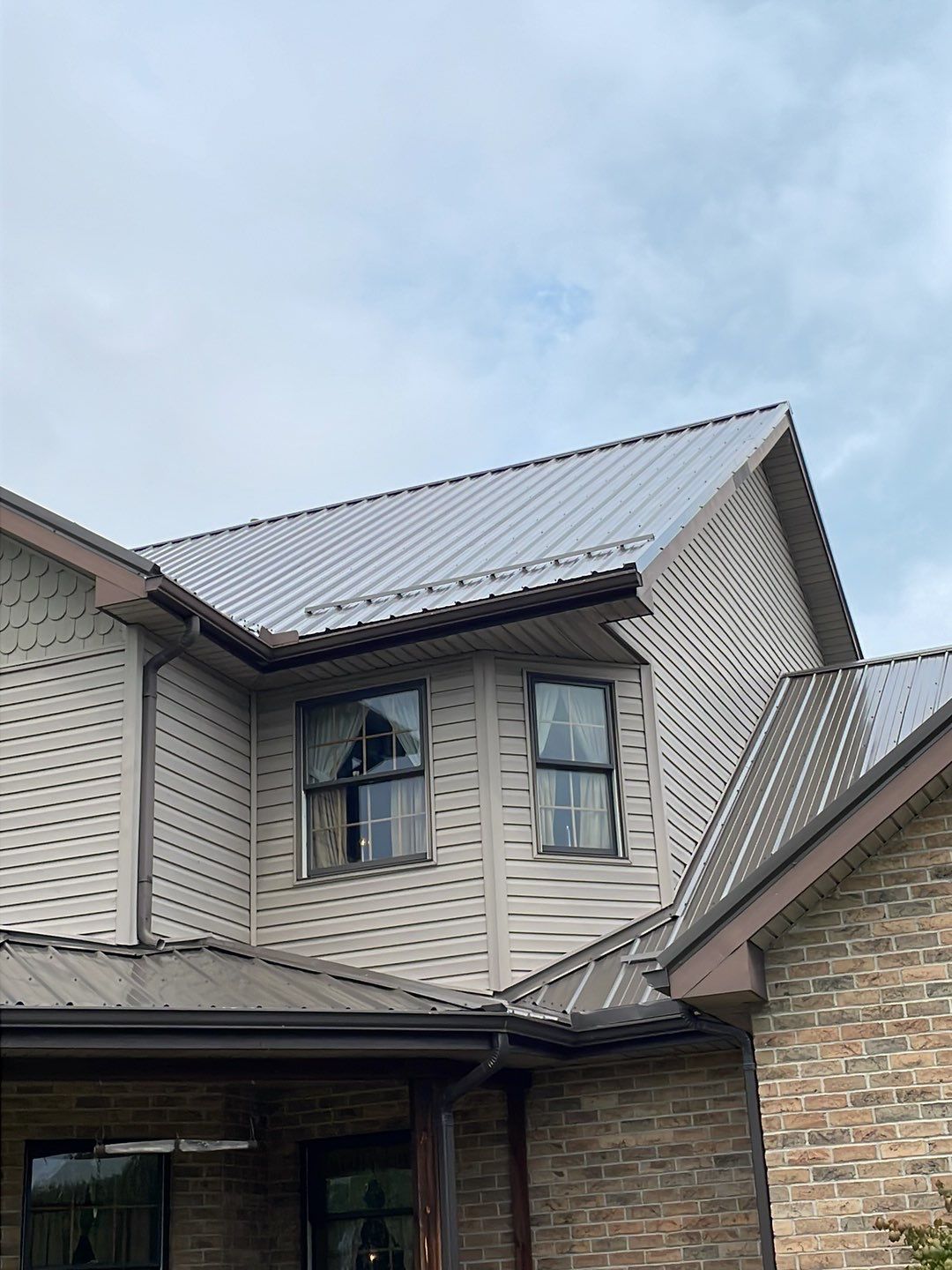 Residential Roofing Installation using Performance Panel Metal - Burnished Slate by RoofX 