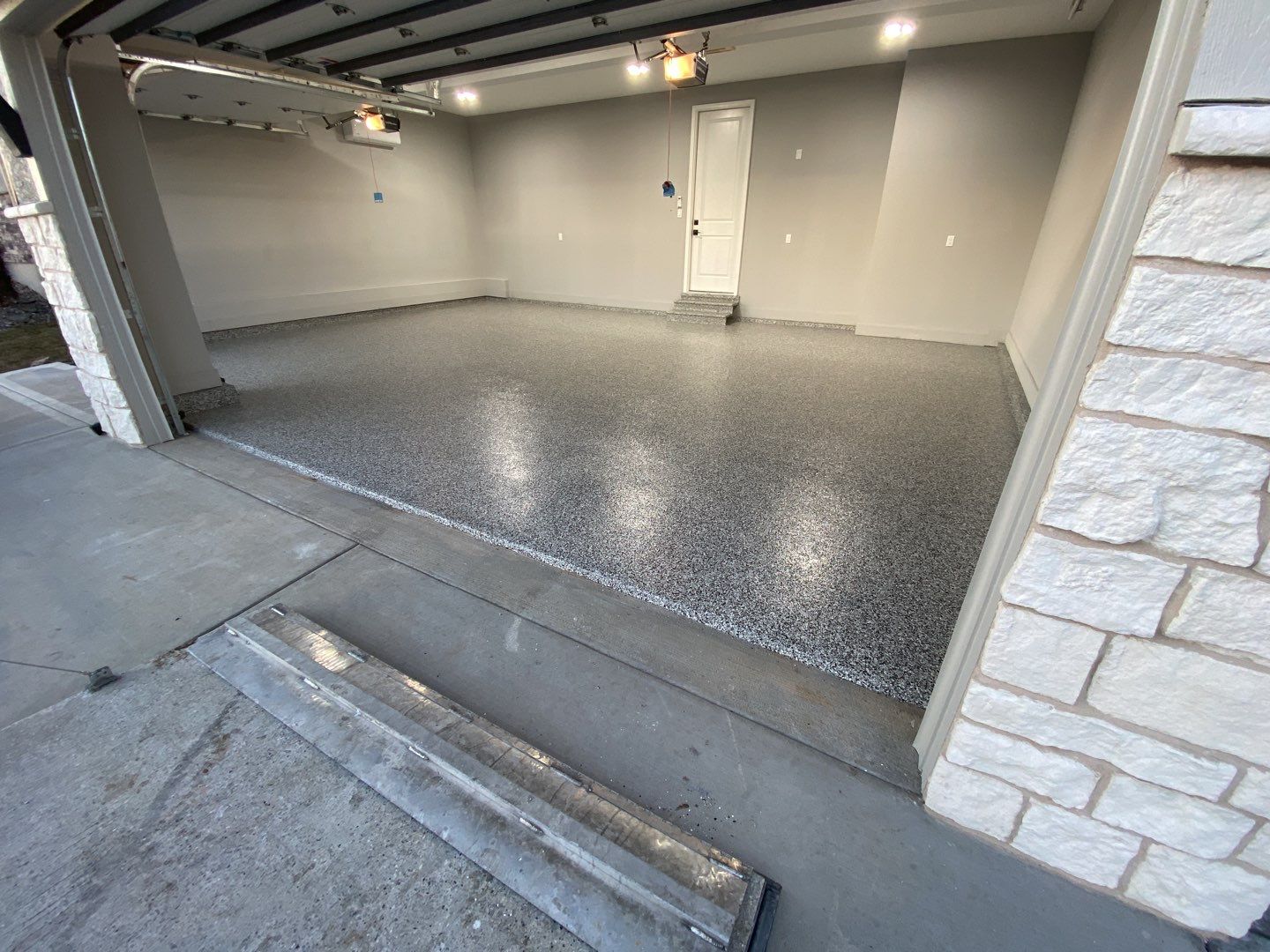 Basement using Chestnut / Garage using Domino by Select Painting, Coatings & Garage Cabinets