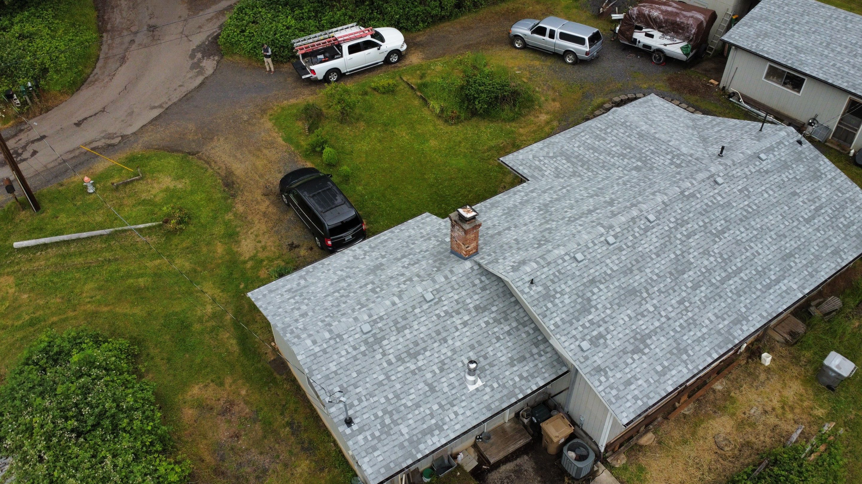 Residential Roofing Installation using IKO Dynasty (Color: Frostone Grey) by Orezona Building & Roofing Company, Inc.