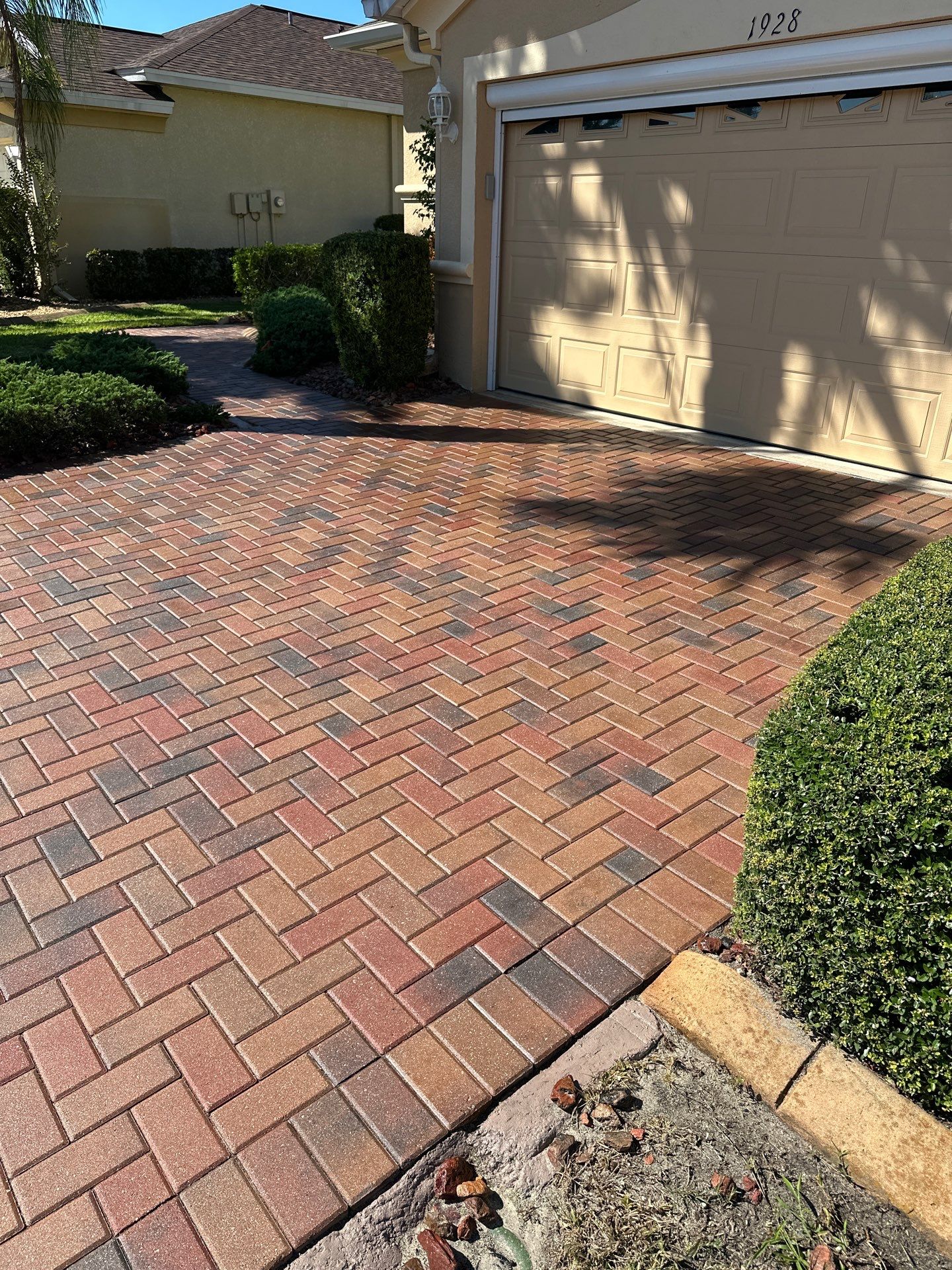 Restoring Multi-Tone Paver Driveway and Walkways in Sun City Center by Supreme Paver Experts