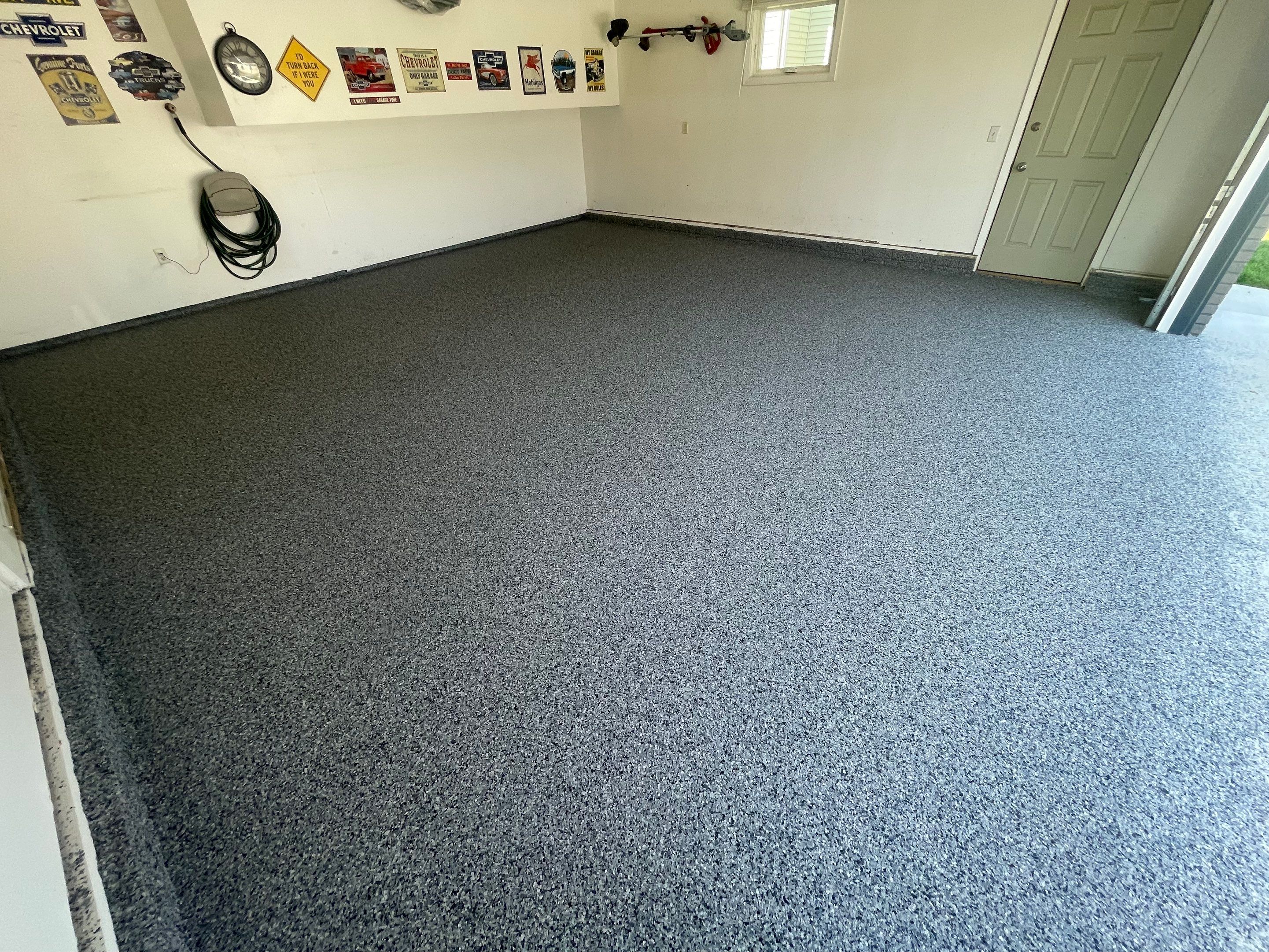 Sioux Falls Garage Floor Coating with Nightfall Decorative Chips by Select Painting, Coatings & Garage Cabinets