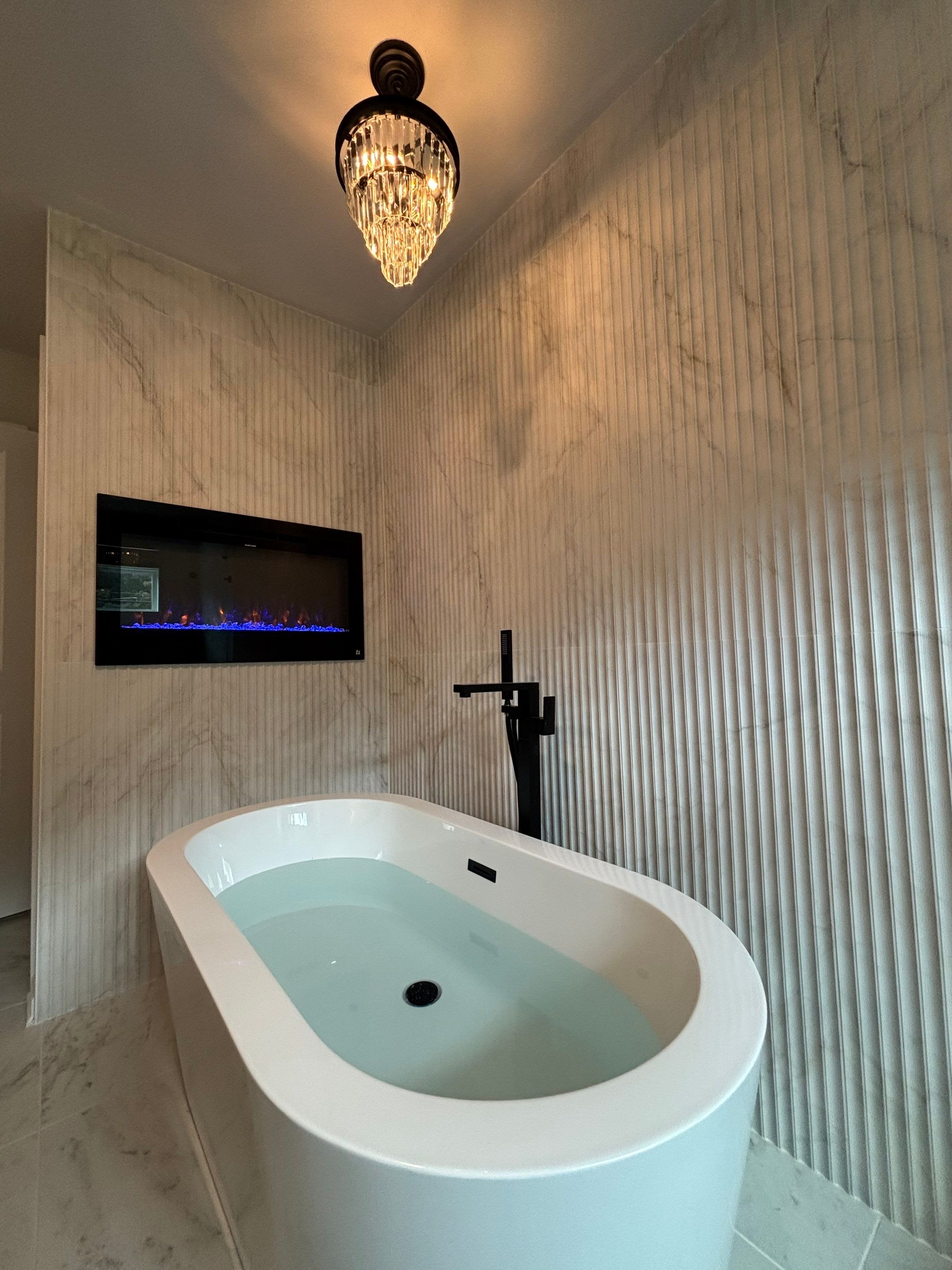 Master bathroom renovation using Free standing tub by Prudencio