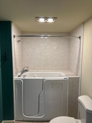 Walk-In Tub Installation with Marbled Surrounds in Leland