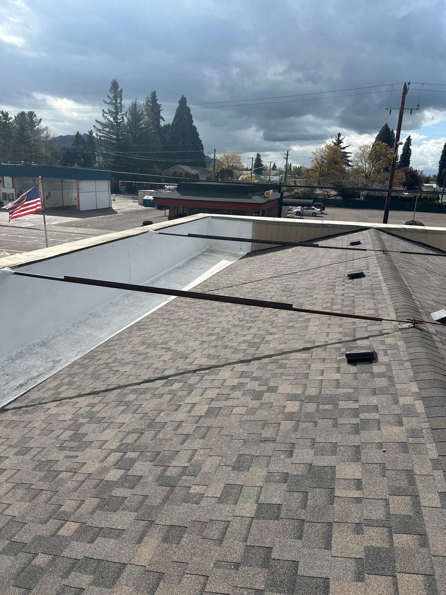 Commercial Roofing Installation using IKO Dynasty & GAF 60Mil TPO by Orezona Building & Roofing Company, Inc.