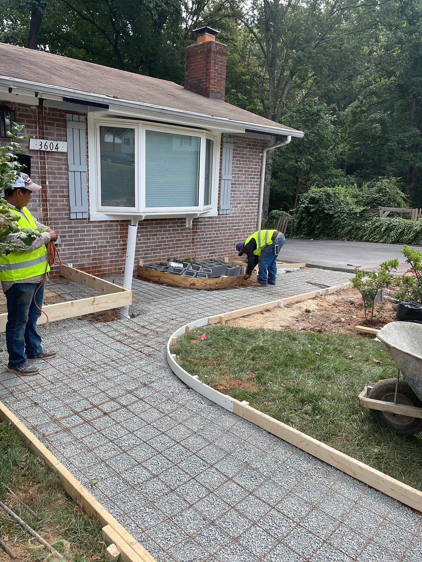 New walkway with stairs and a new front porch by Fairfax Contractors, LLC
