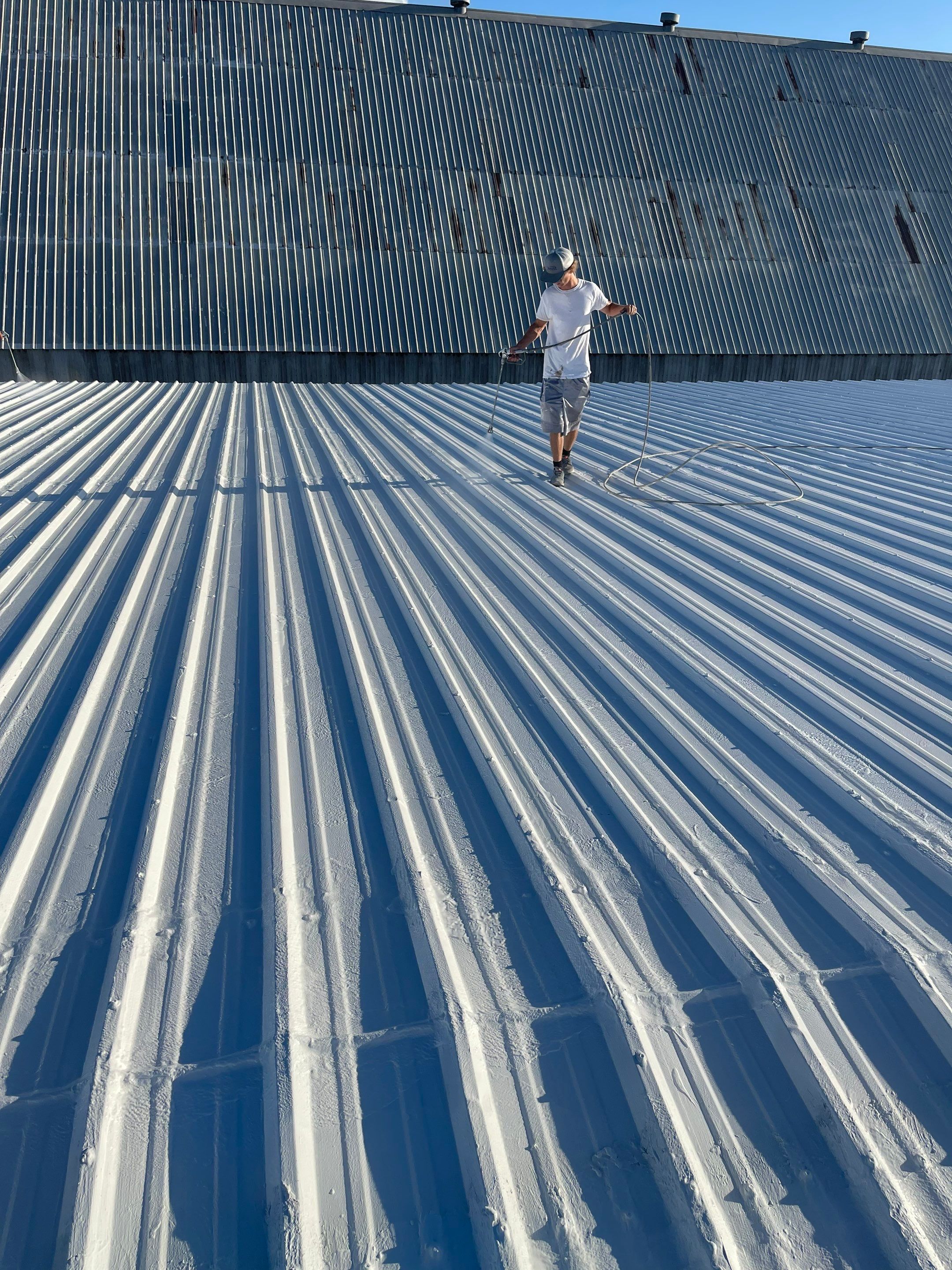 Commercial Roofing Installation using GAF 10 Year Acrylic System by Lighthouse Roofing