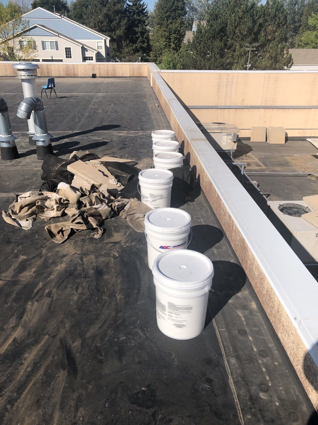 Commercial Roofing Installation using American Standard Coating - S  by A to Z Roofing